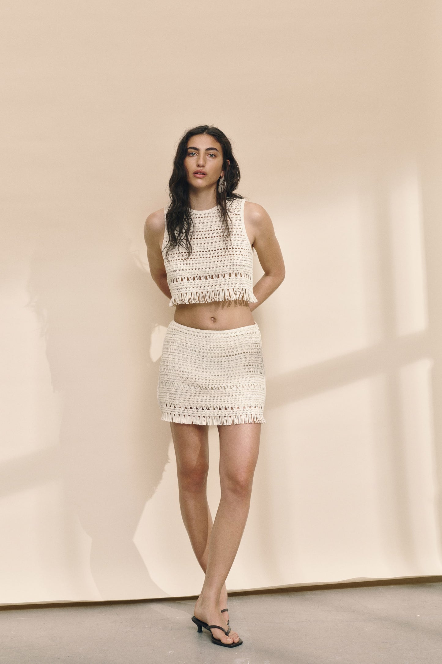 Crochet-look mini skirt