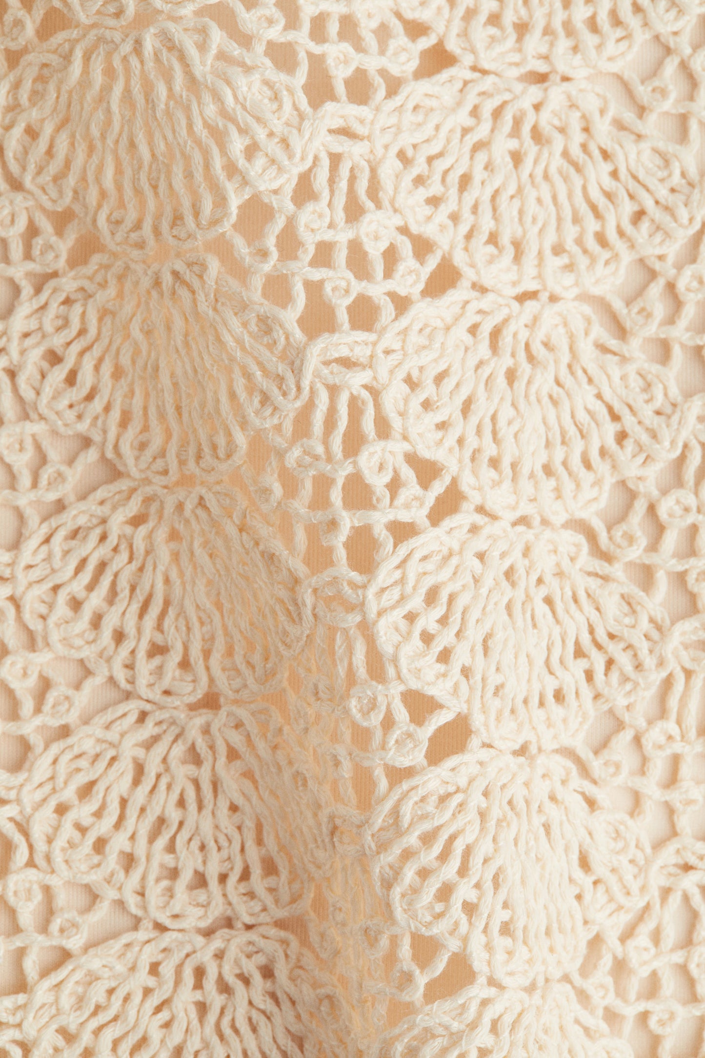 Crochet-look mini skirt