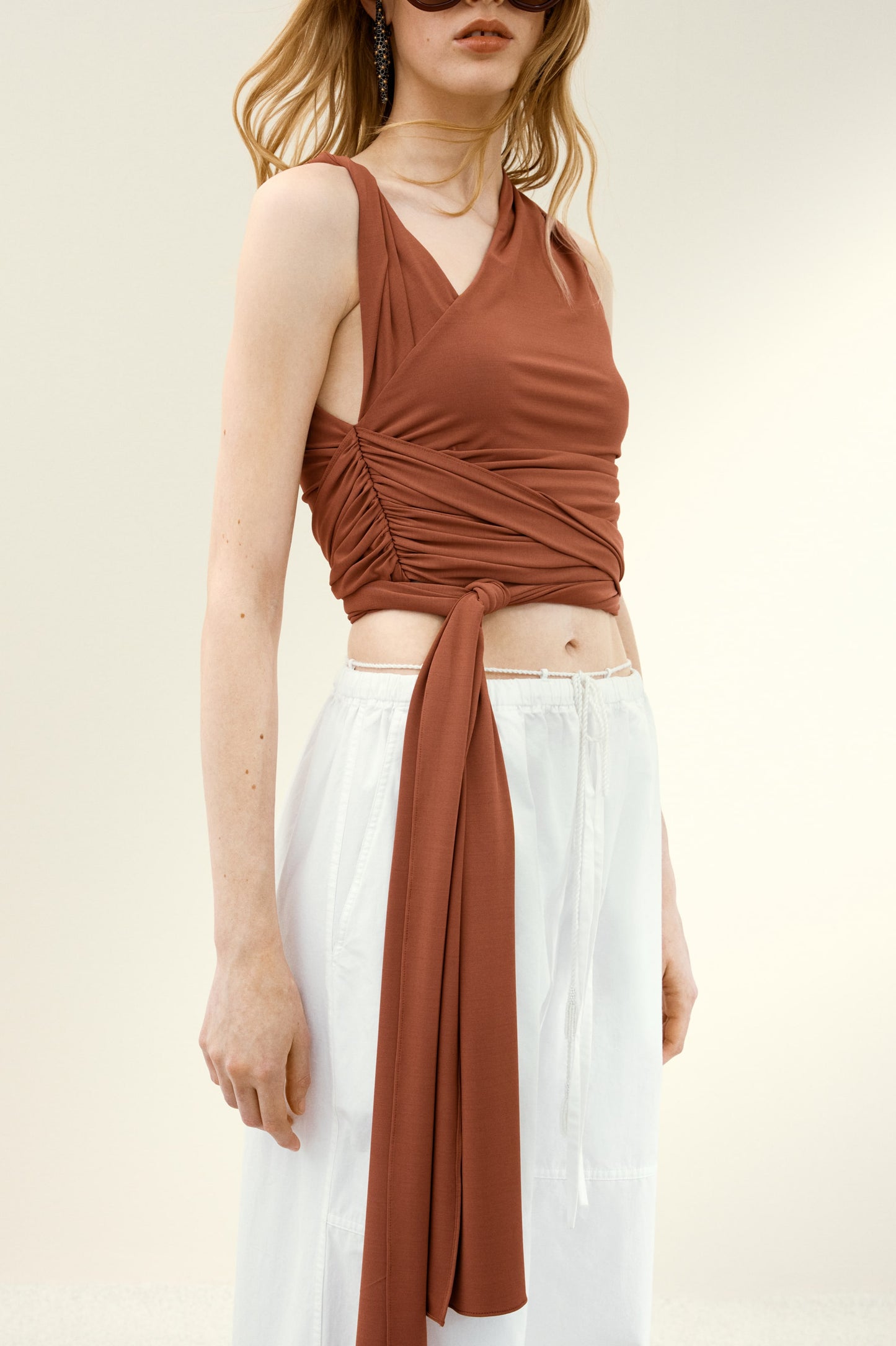 Asymmetric wrap top