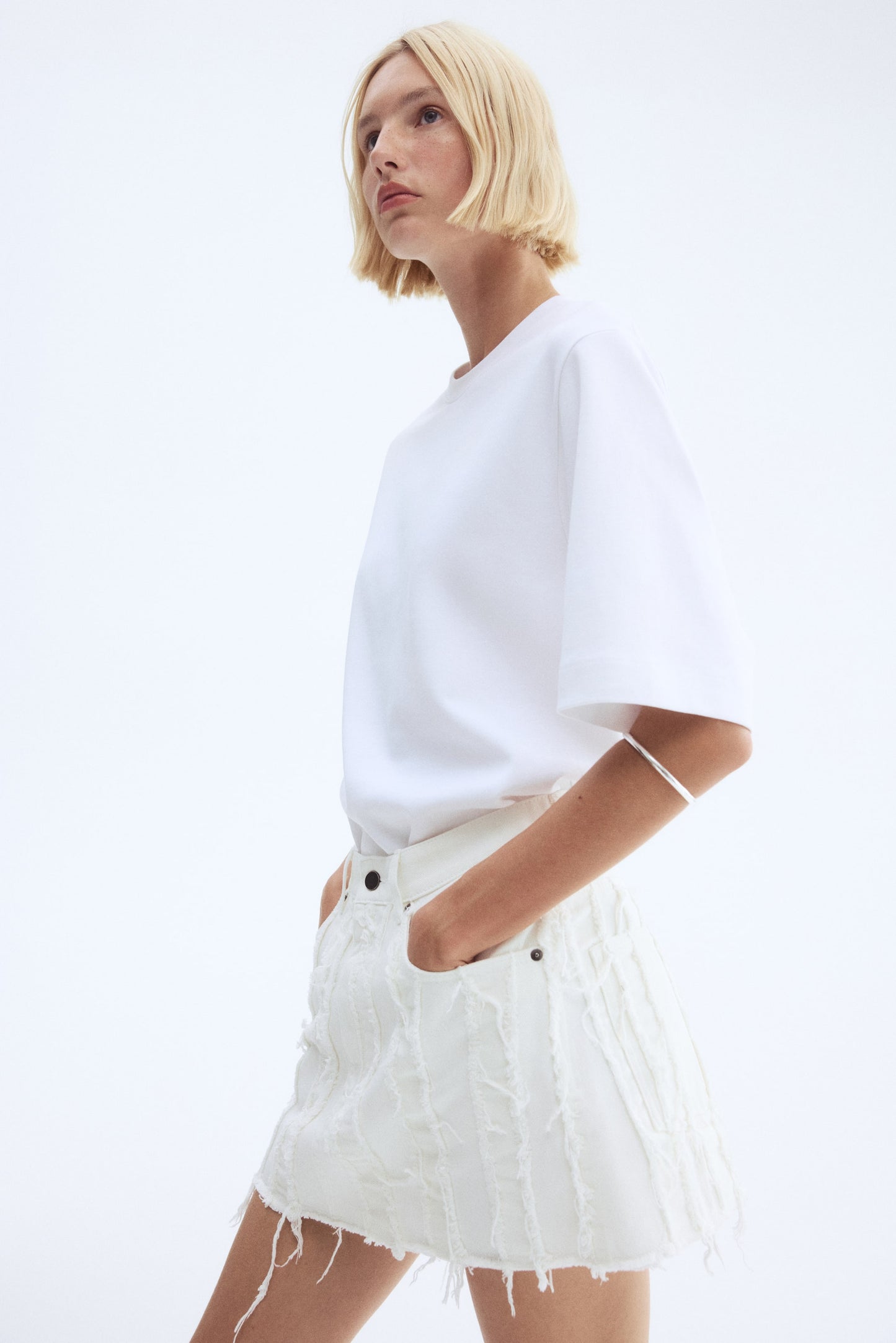 Frayed denim mini skirt