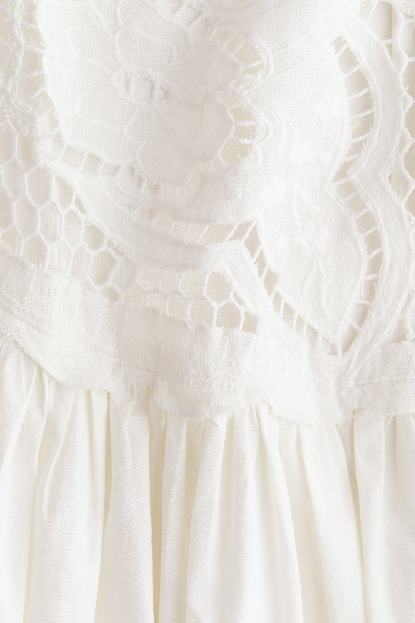 Embroidered linen-blend dress