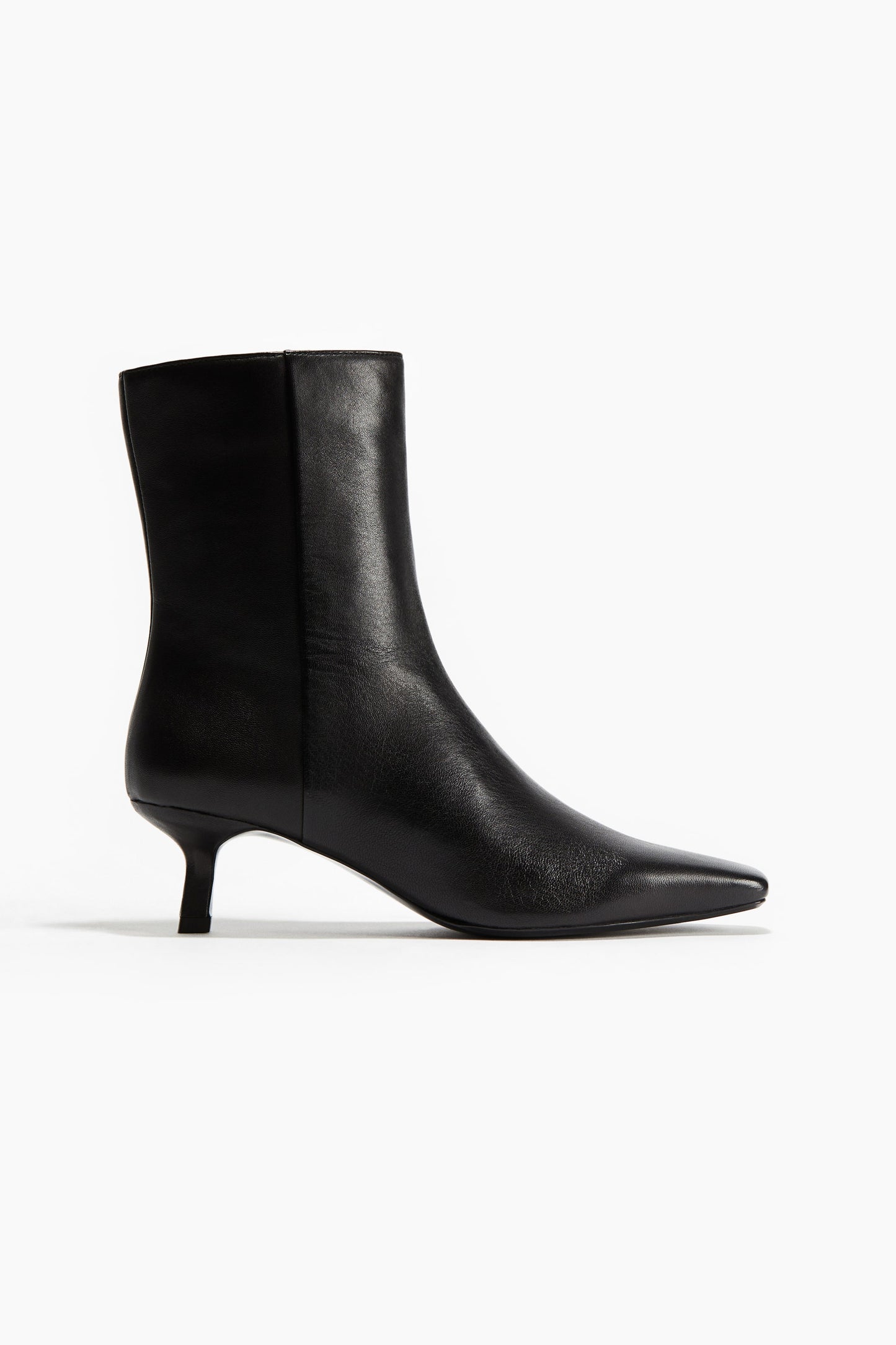 Heeled leather boots