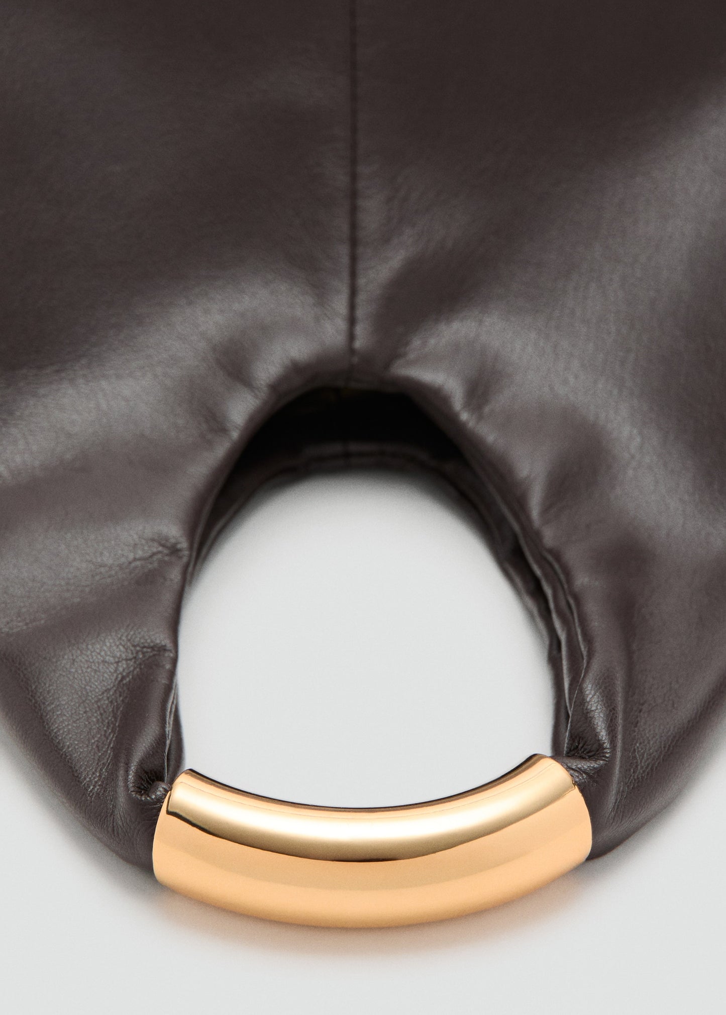 Handbag with metal handle