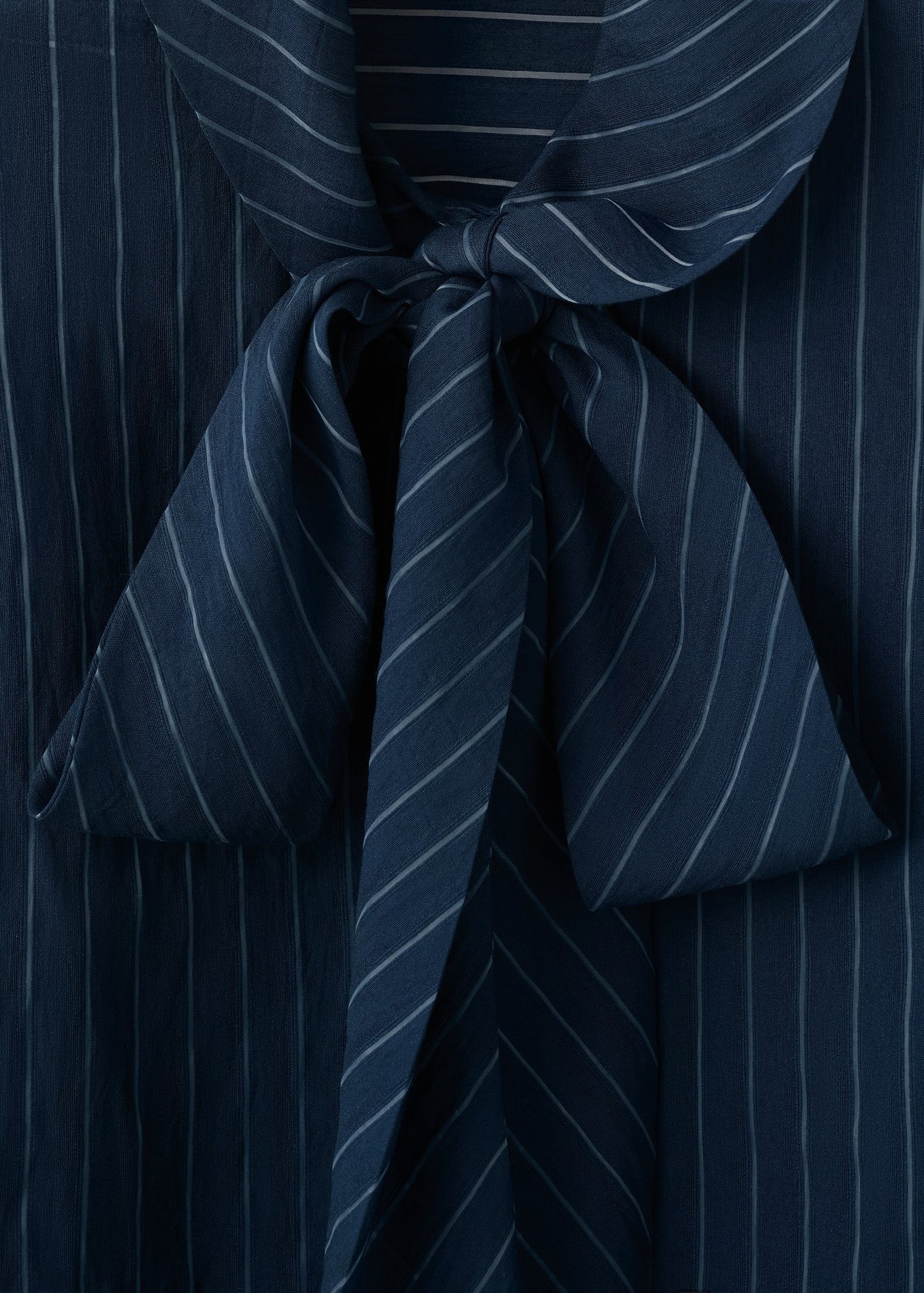 Striped blouse with bow tie neck