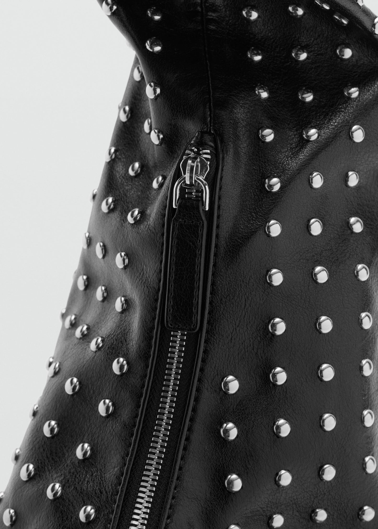 Oval studded shoulder bag