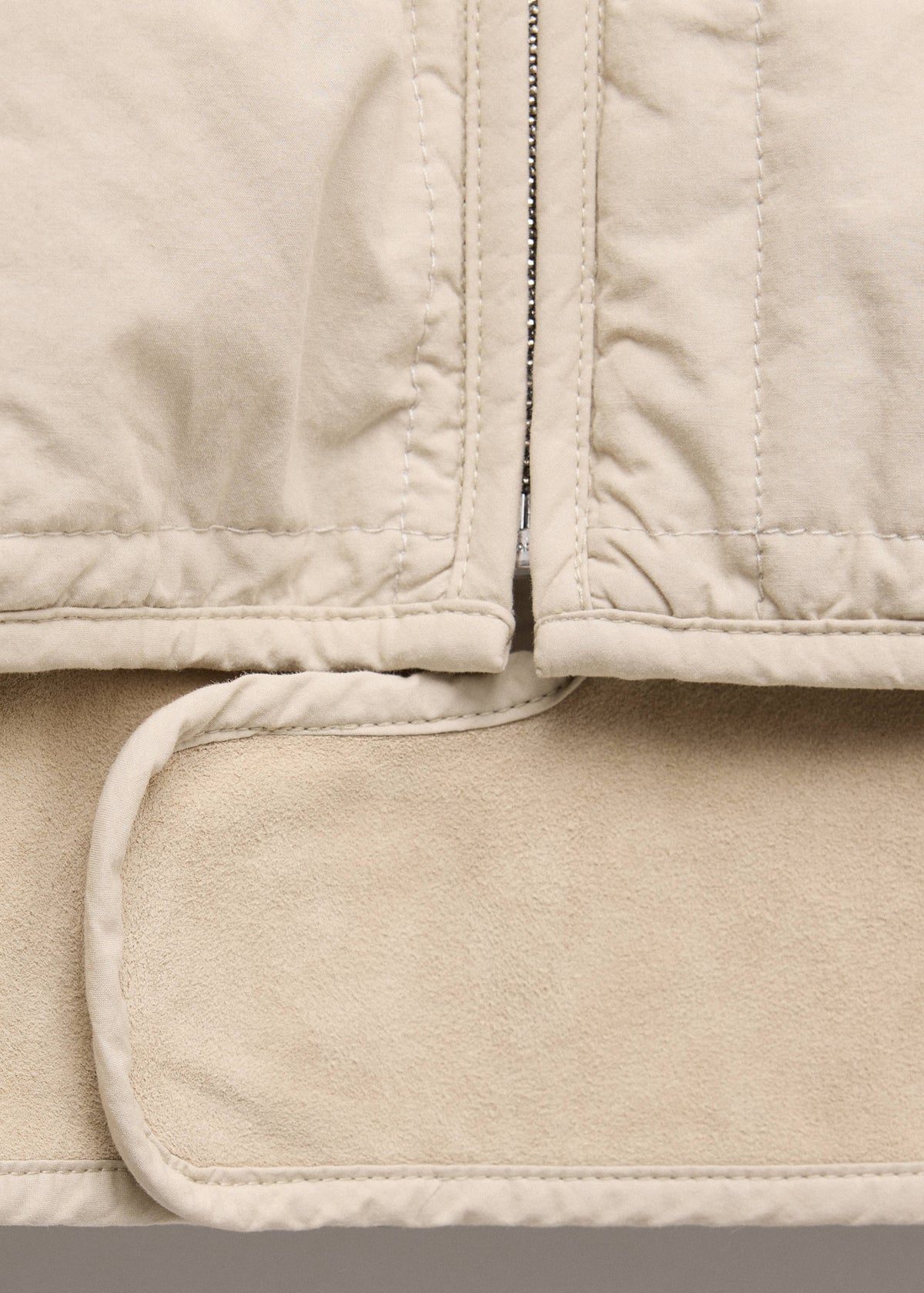 Quilted jacket with leather panels
