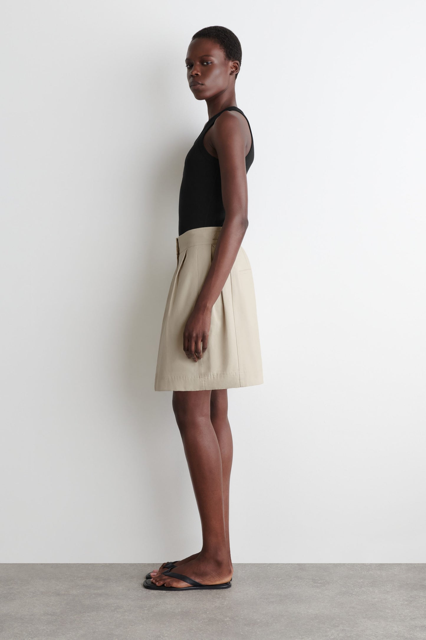 Pleated Buckle-Detail Mini Skirt