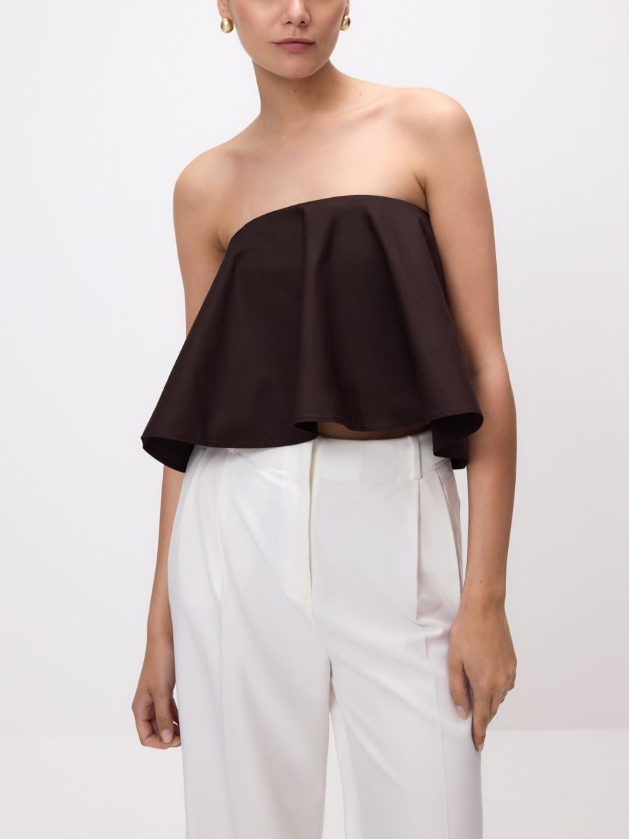 Tie vest with embellishments