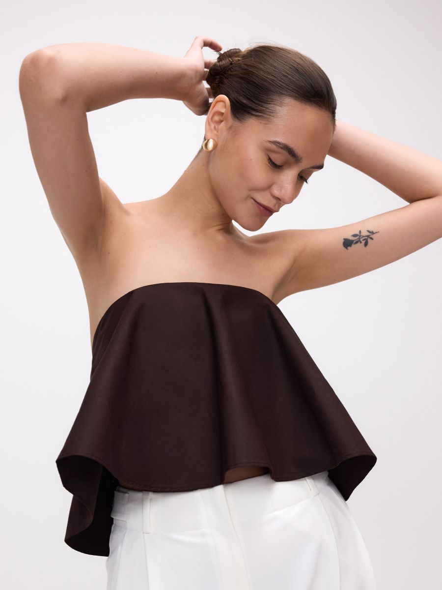Tie vest with embellishments