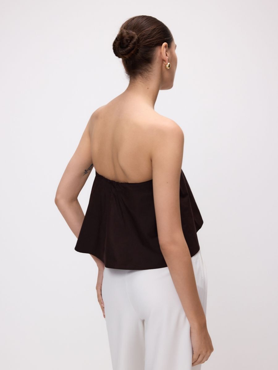 Tie vest with embellishments