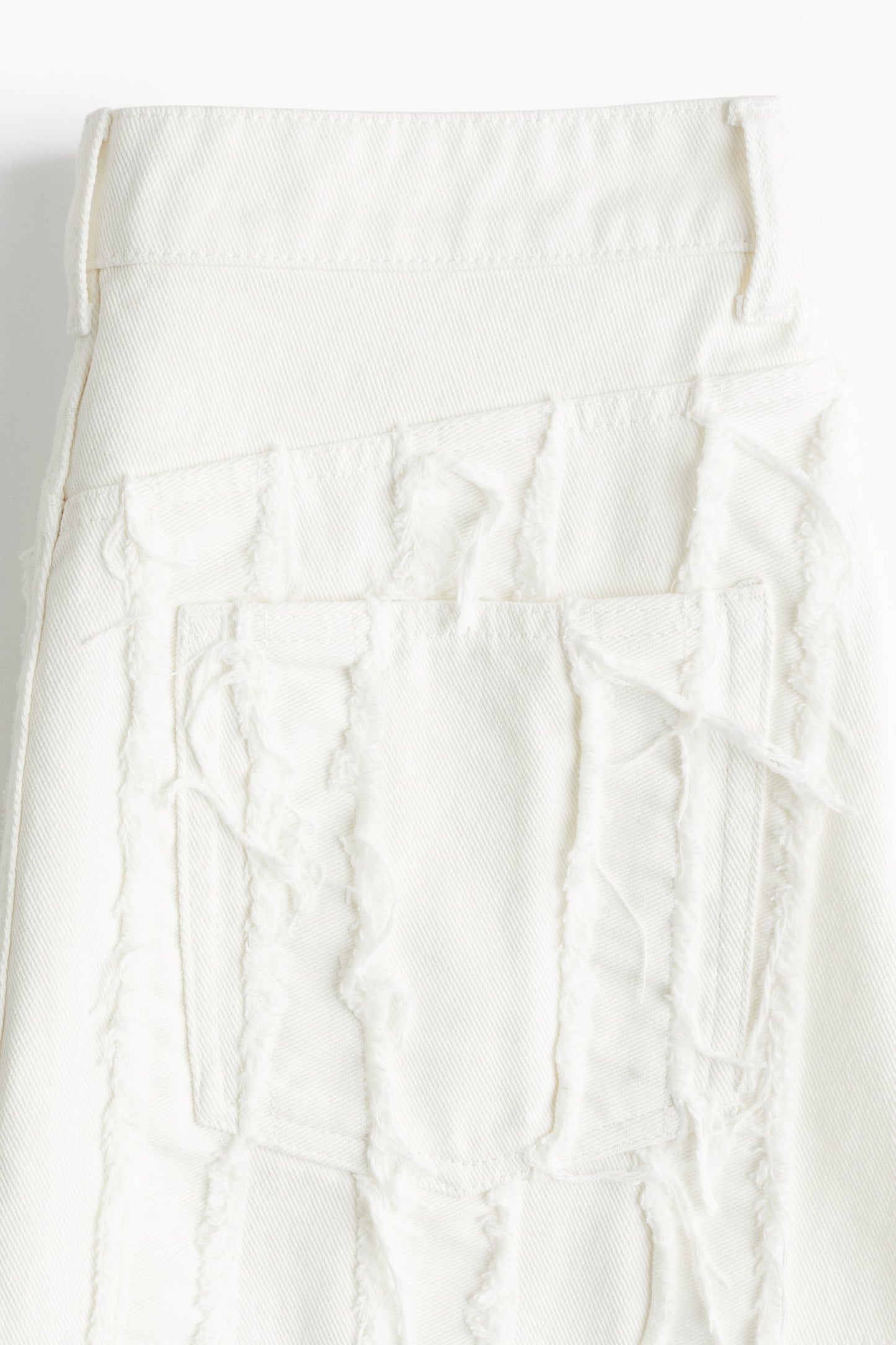 Frayed denim mini skirt
