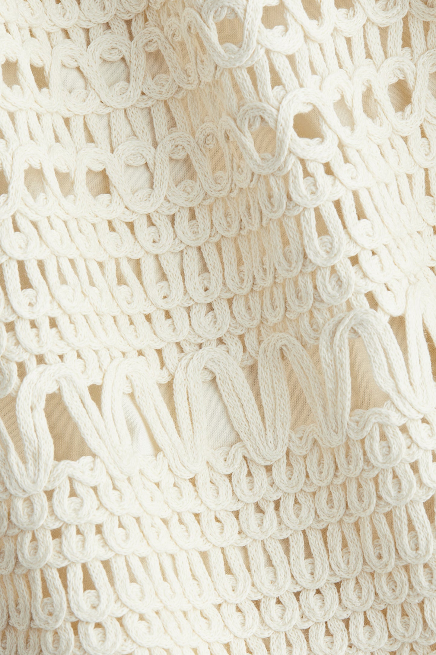 Crochet-look mini skirt