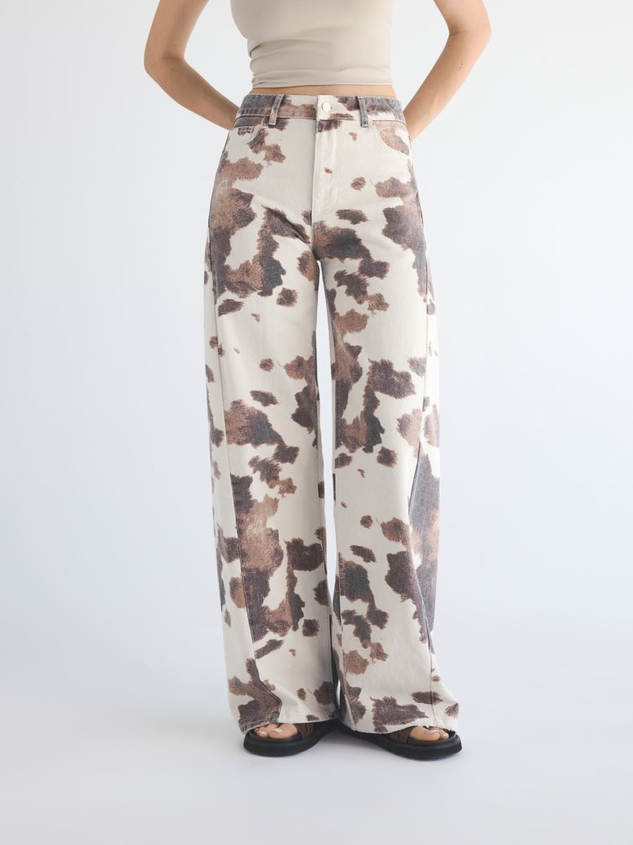 LADIES` JEANS TROUSERS