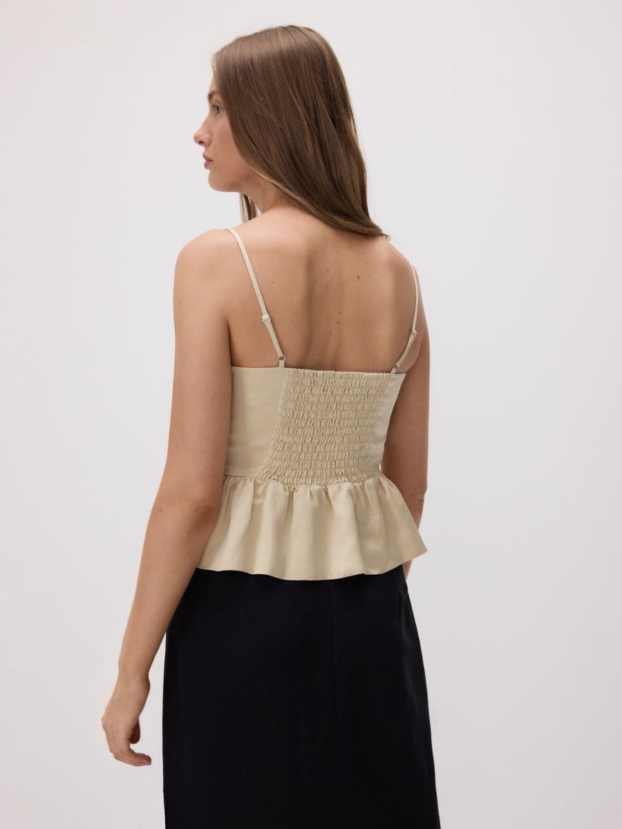 Satin top with peplum hem