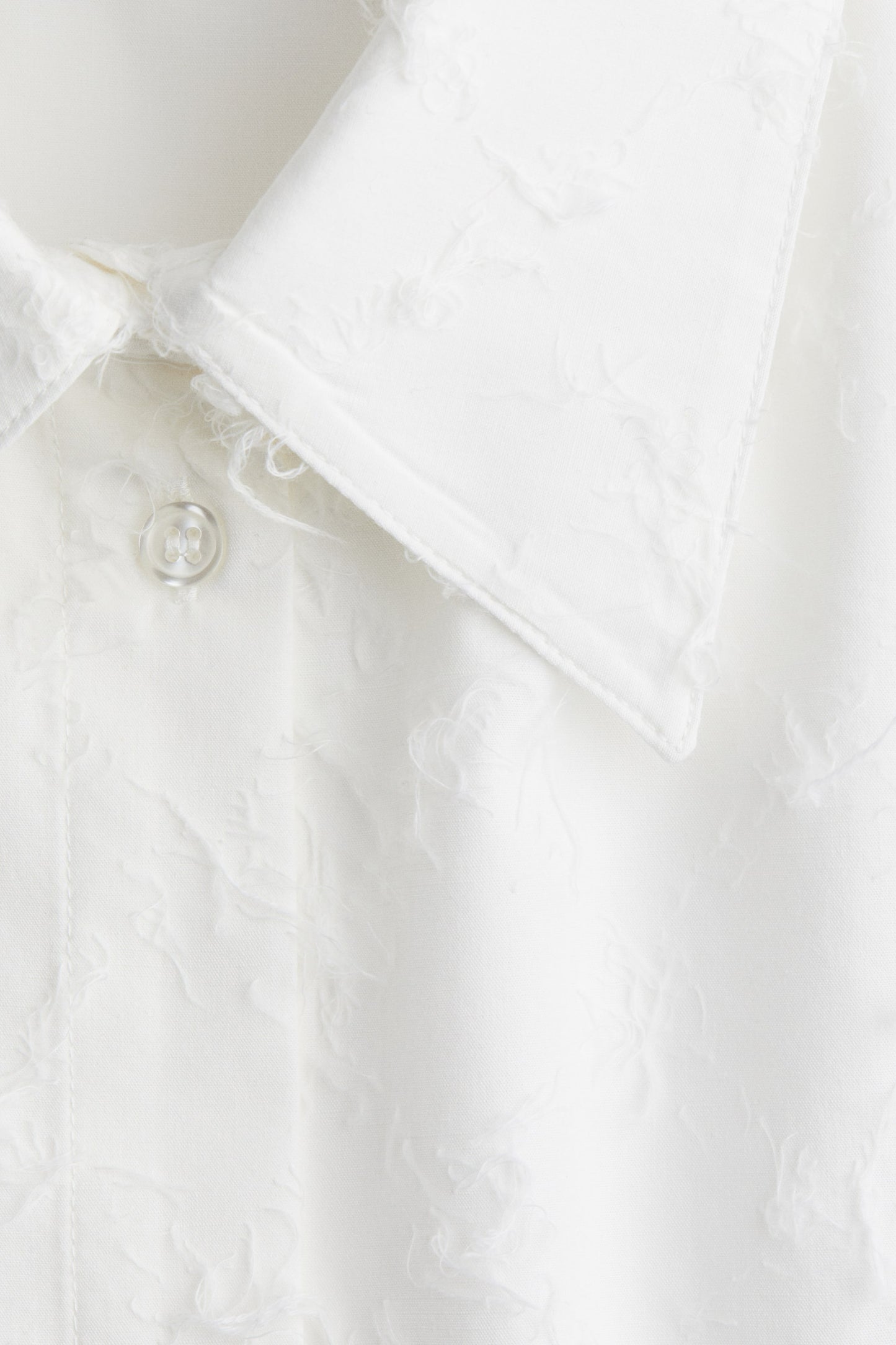 Oversized fringed shirt