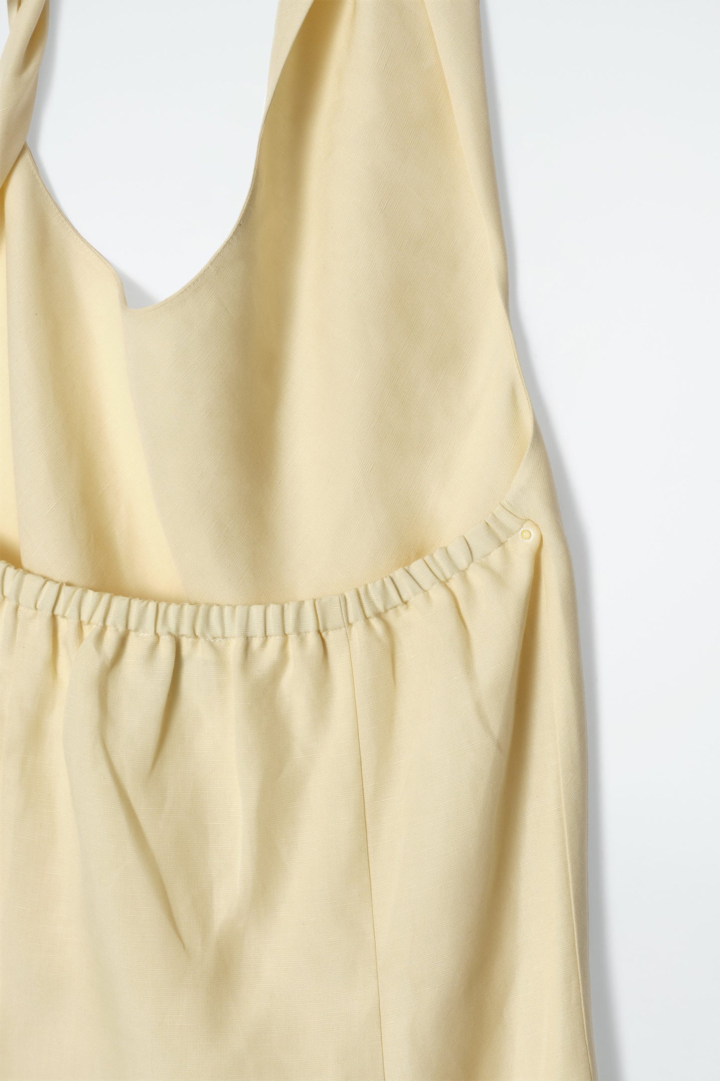 Twisted linen-blend halterneck dress