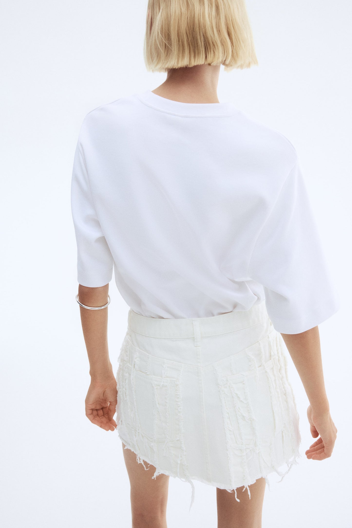 Frayed denim mini skirt