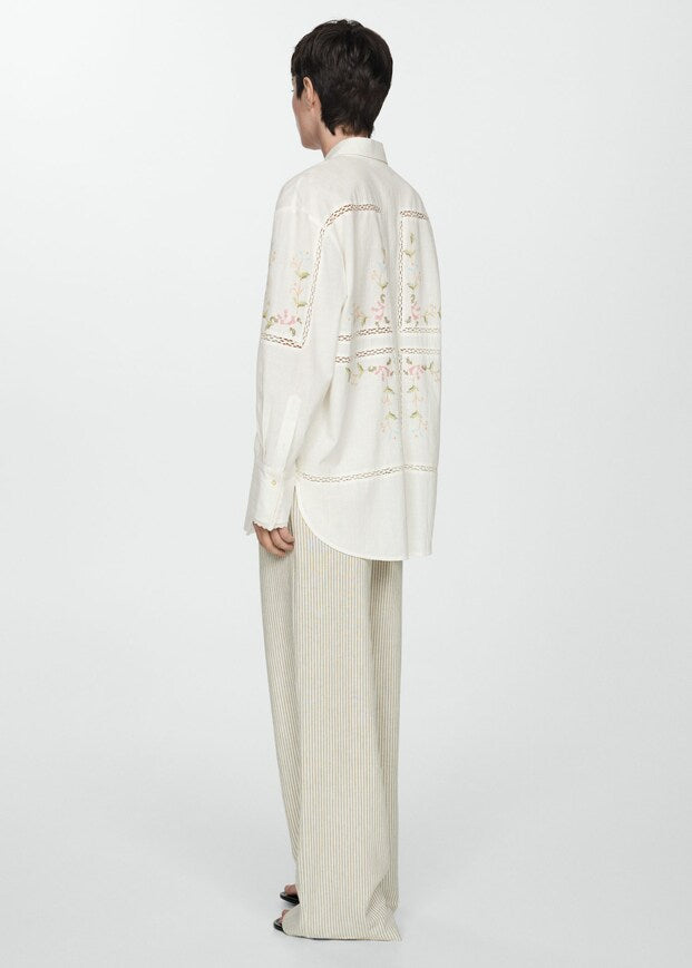 Oversized shirt with embroidered detail