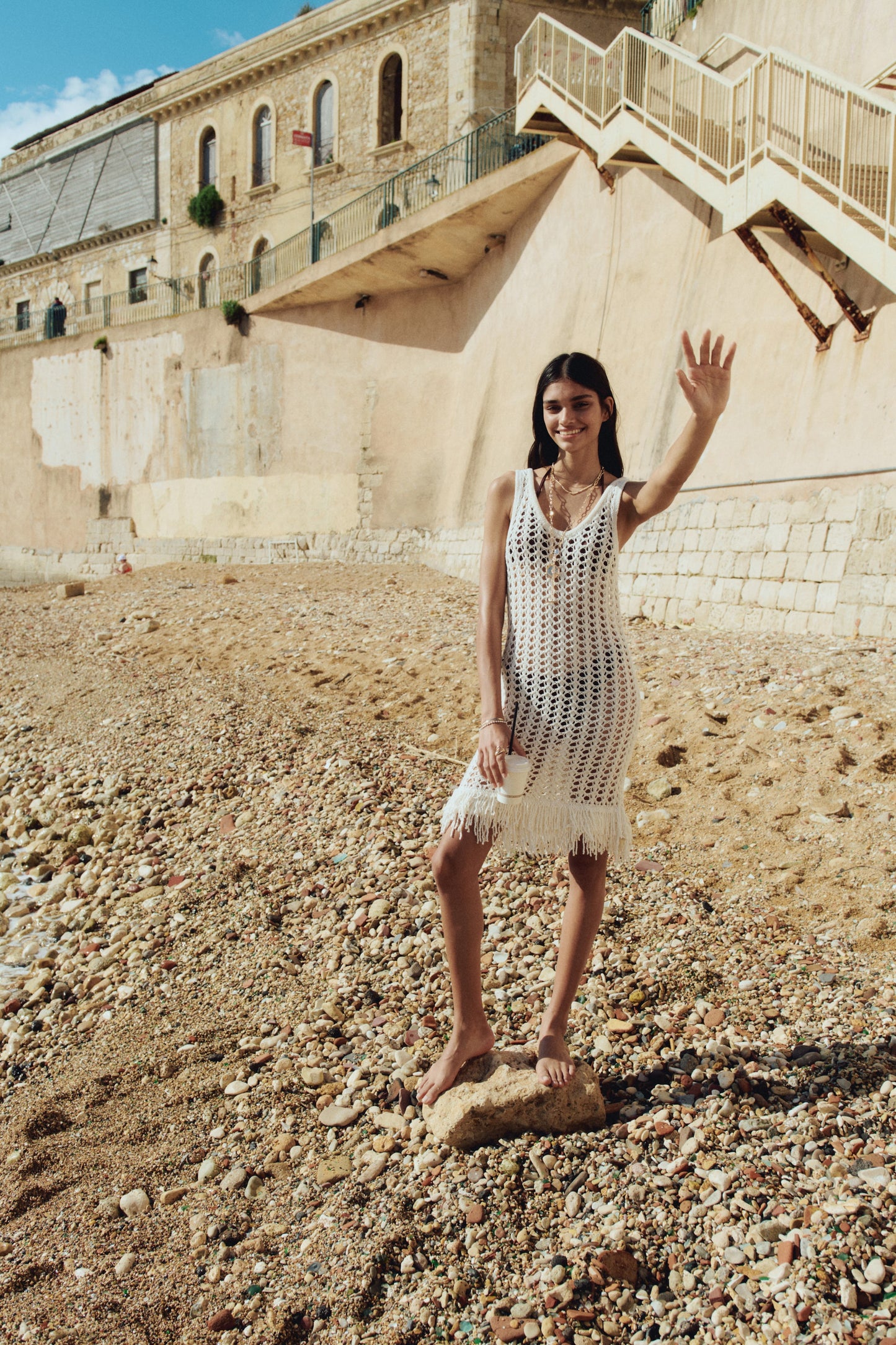 Fringe-trimmed hole-knit dress