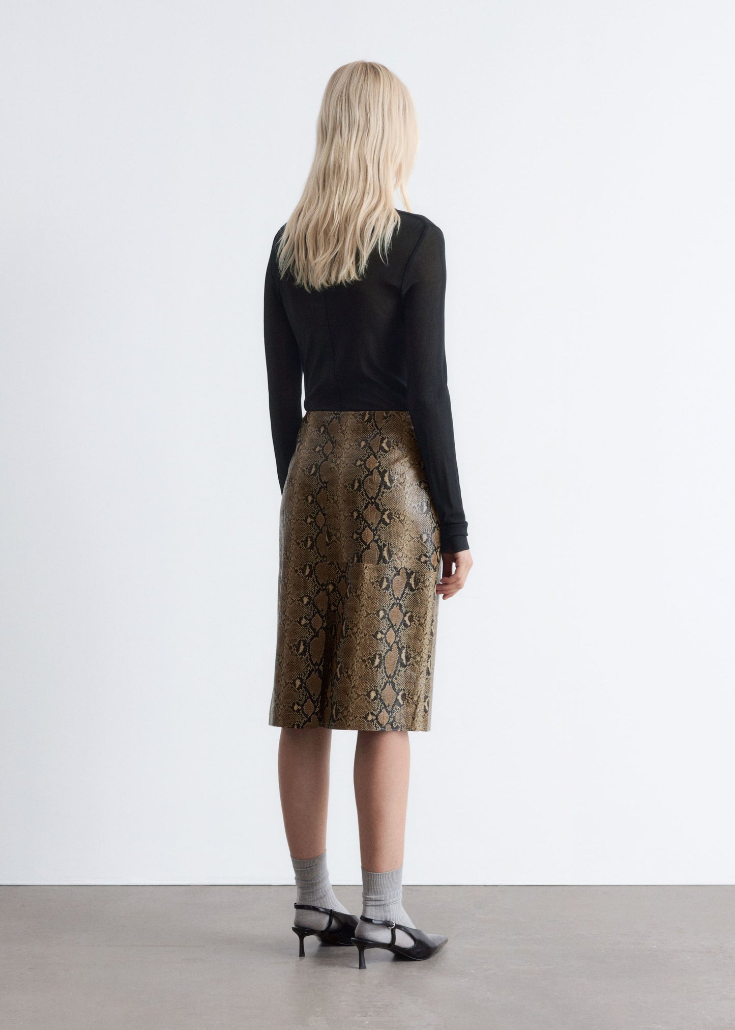 Snake Pattern Leather Midi Skirt