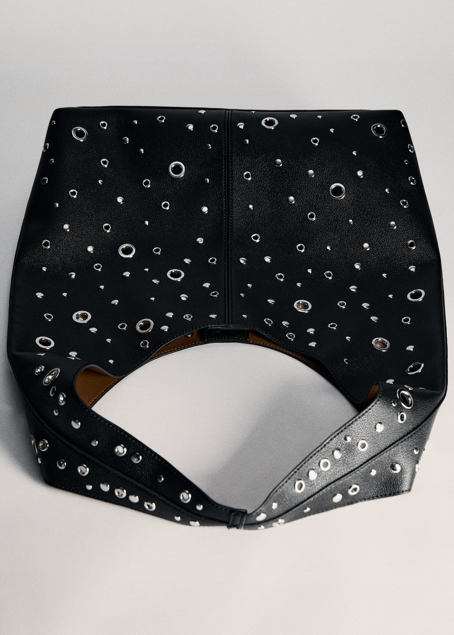 Studded die-cut bag