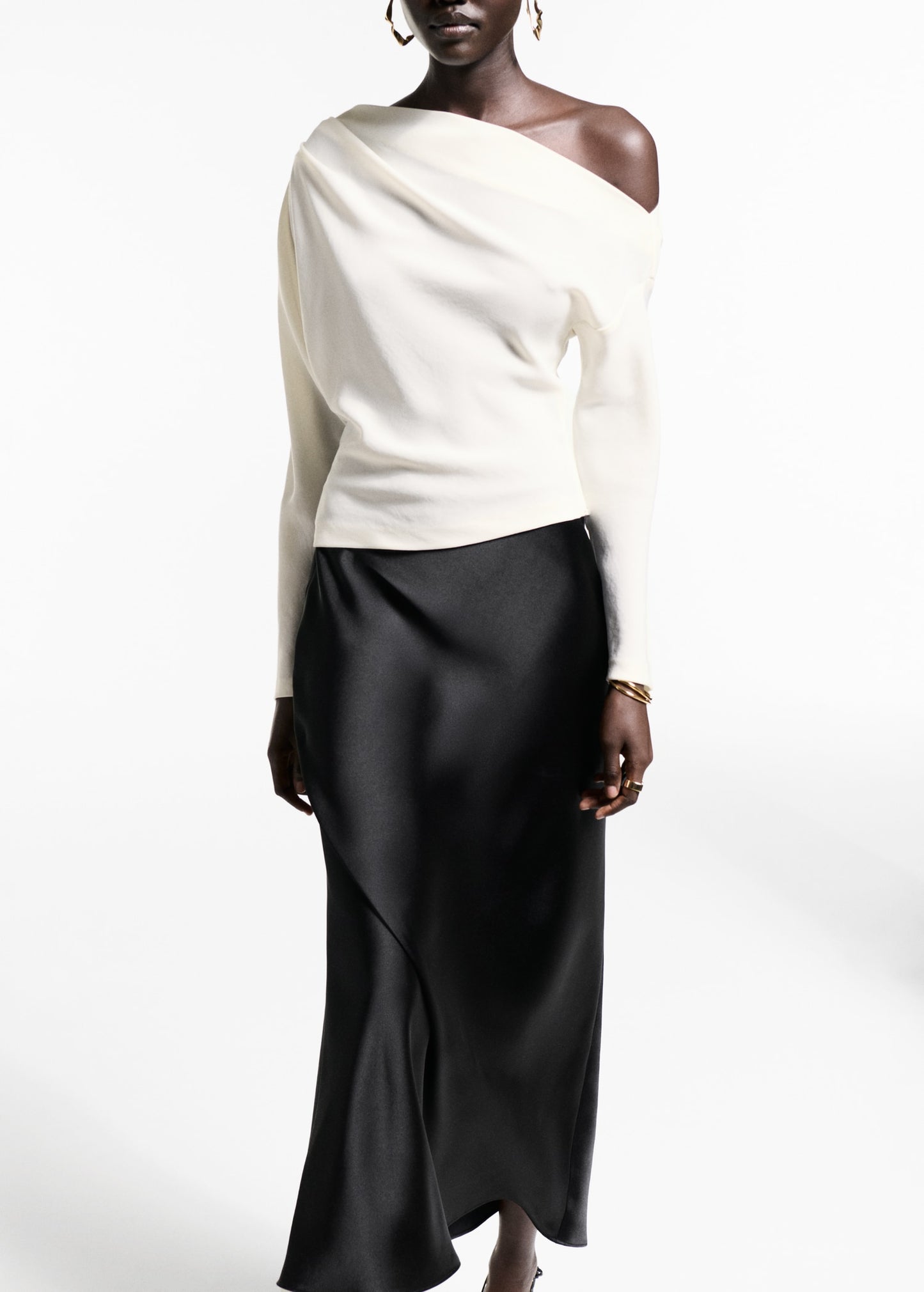 Asymmetrical blouse with pleat detail