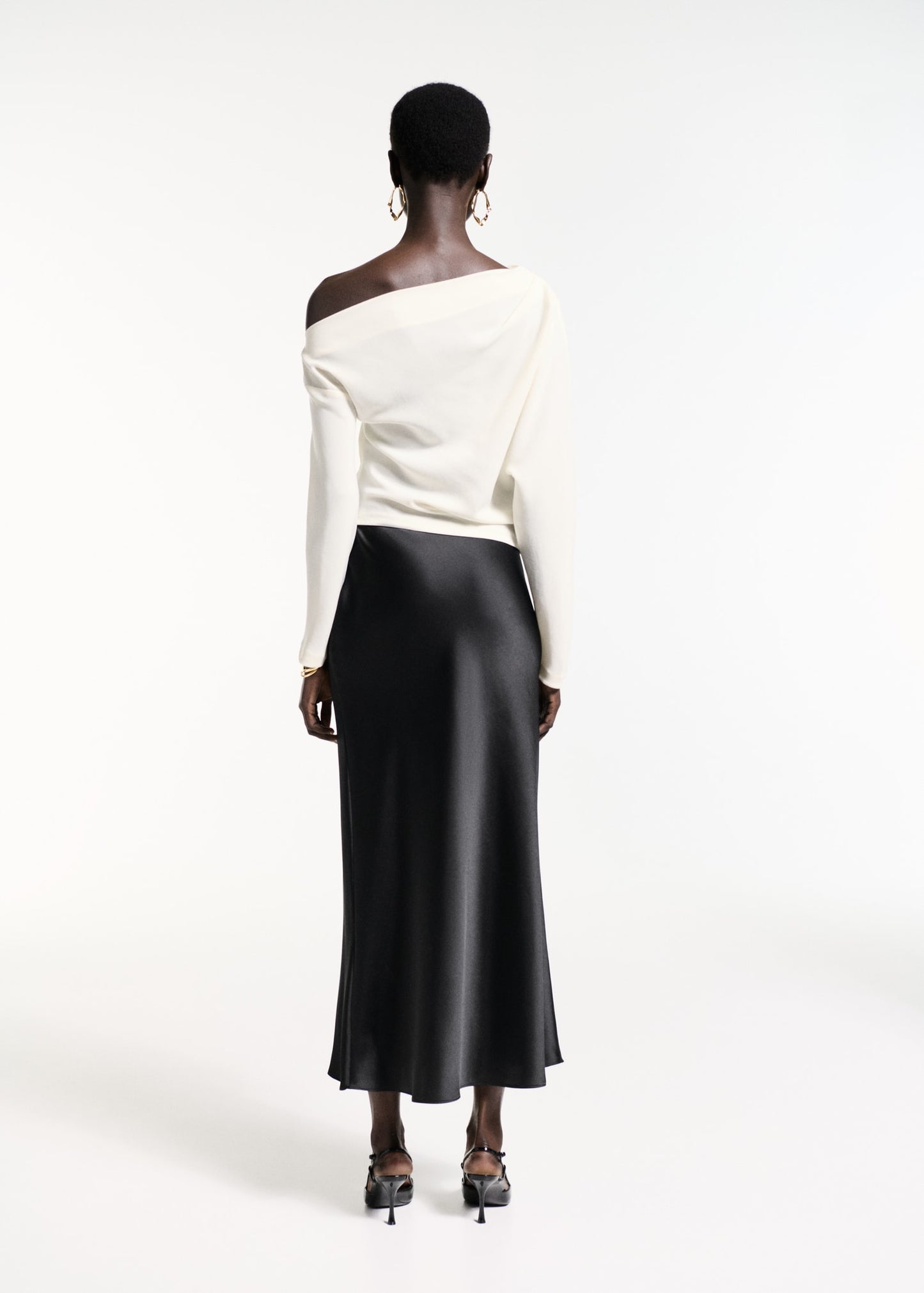 Asymmetrical blouse with pleat detail