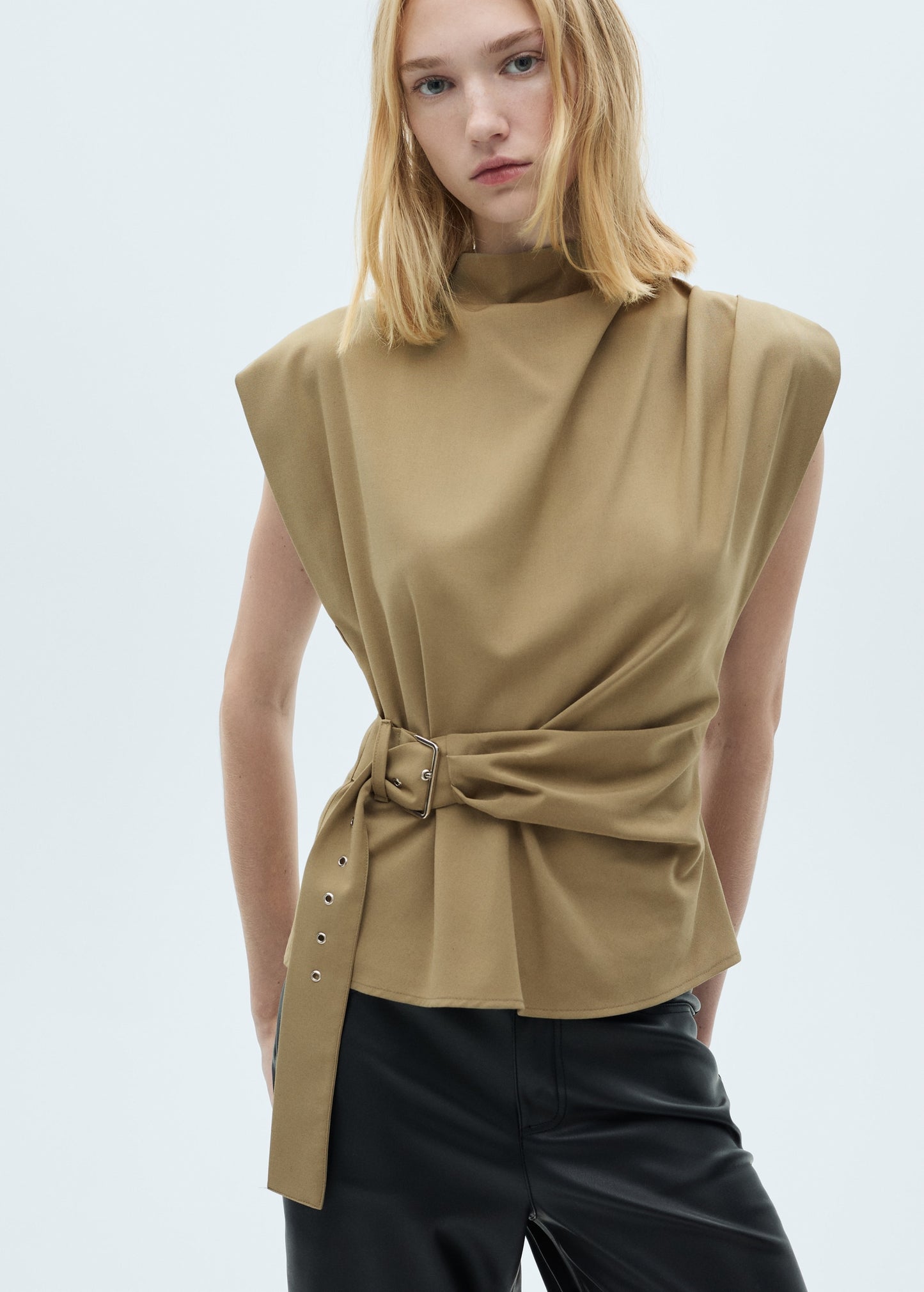 Blouse with shoulder pads and belt