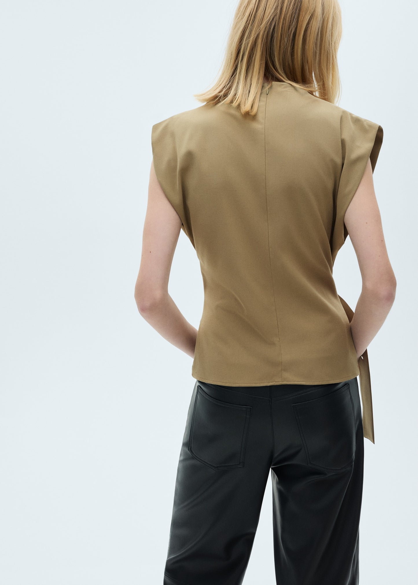 Blouse with shoulder pads and belt