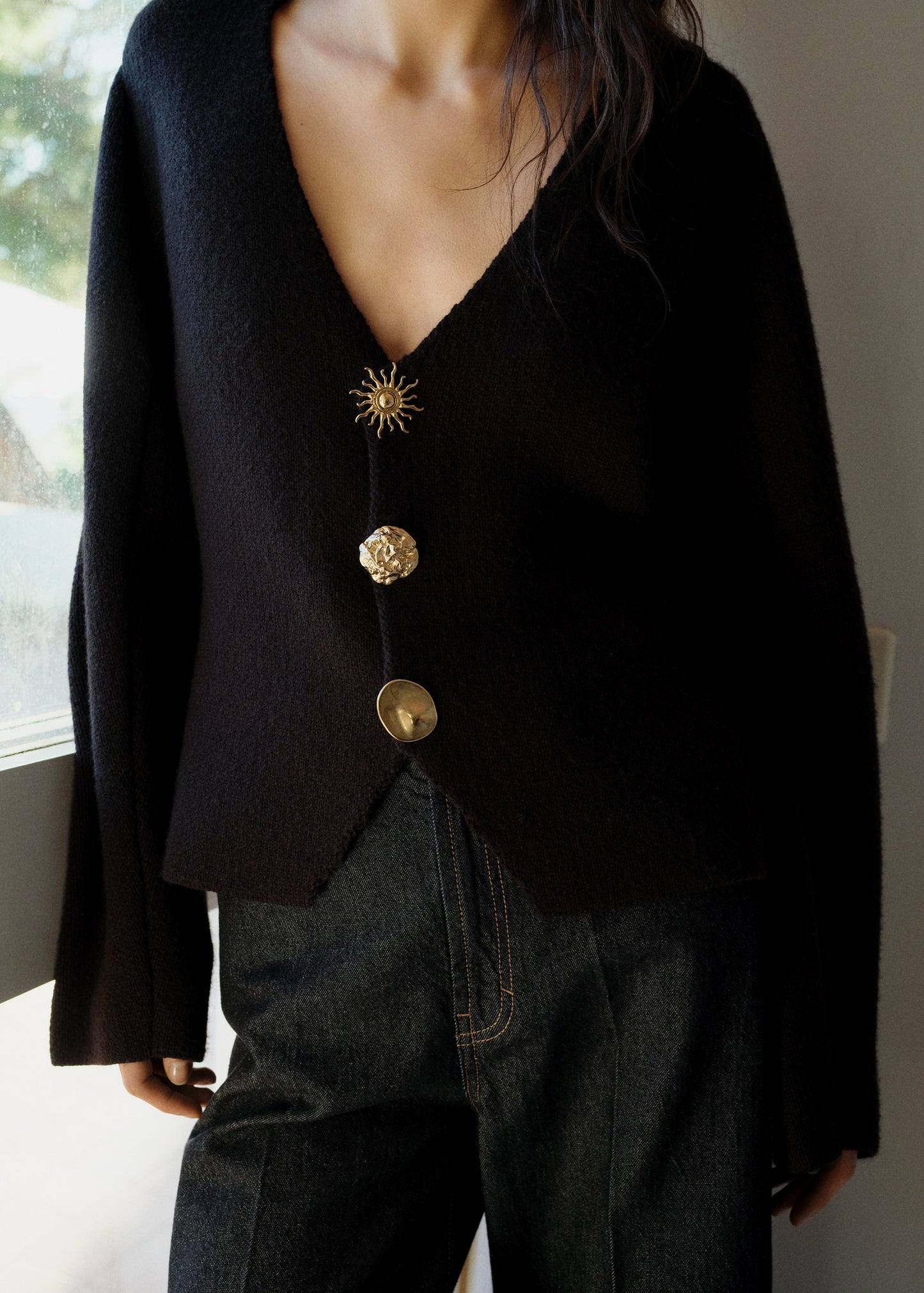Knitted jacket with jewel buttons