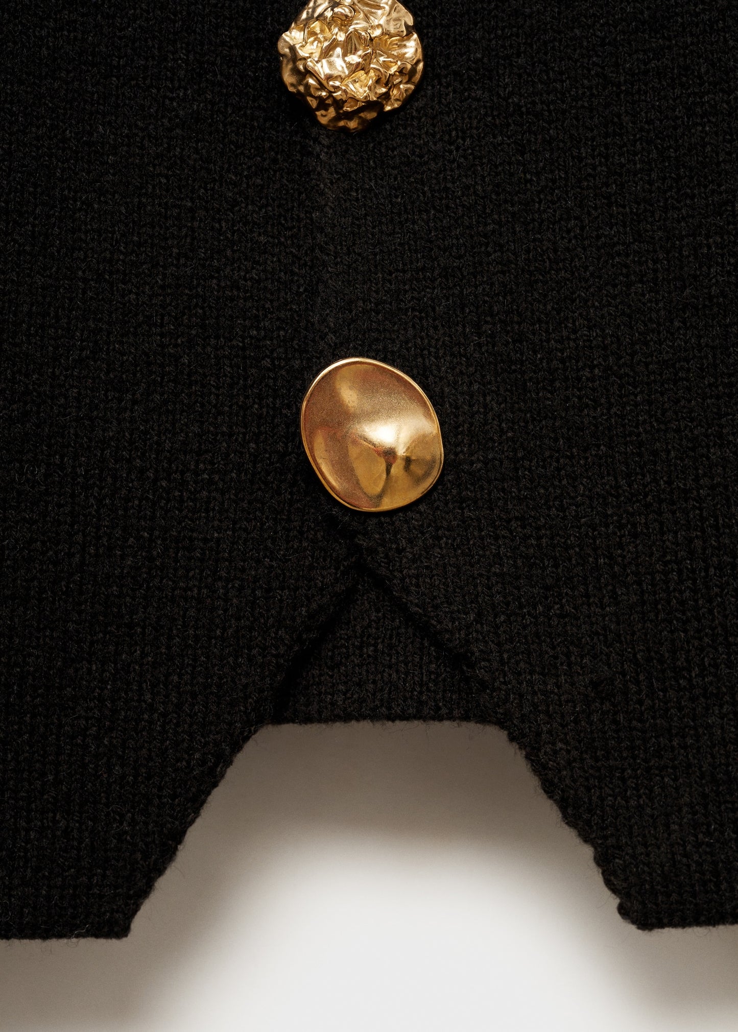 Knitted jacket with jewel buttons