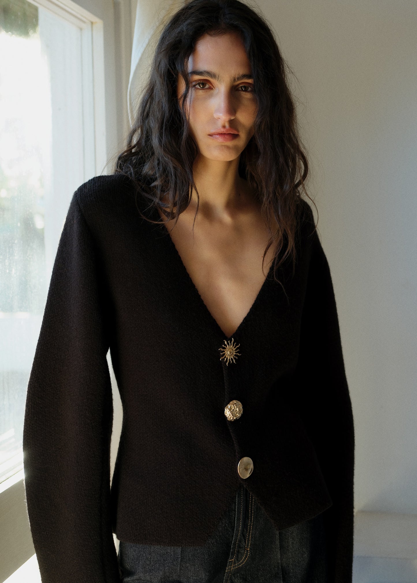 Knitted jacket with jewel buttons