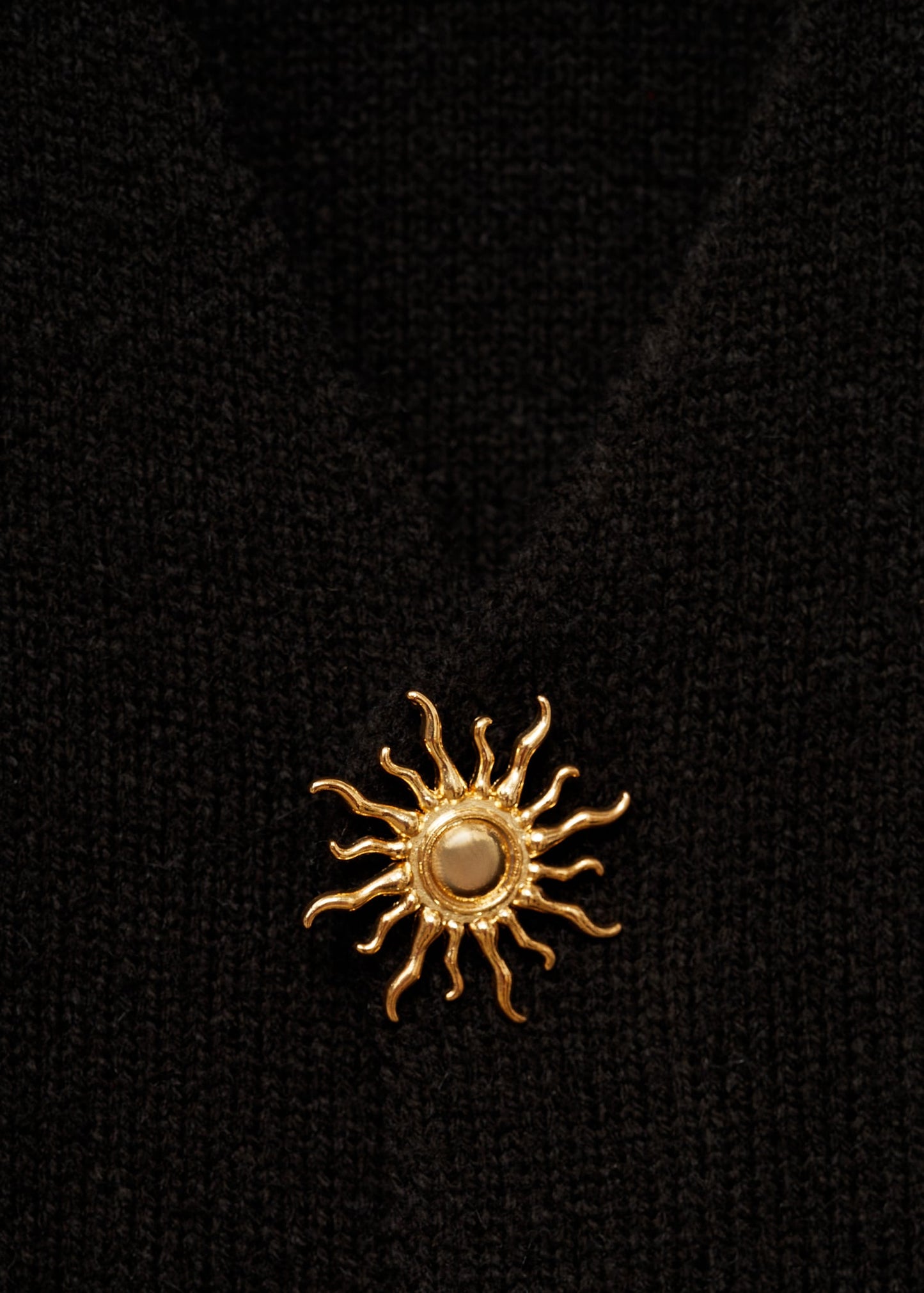 Knitted jacket with jewel buttons