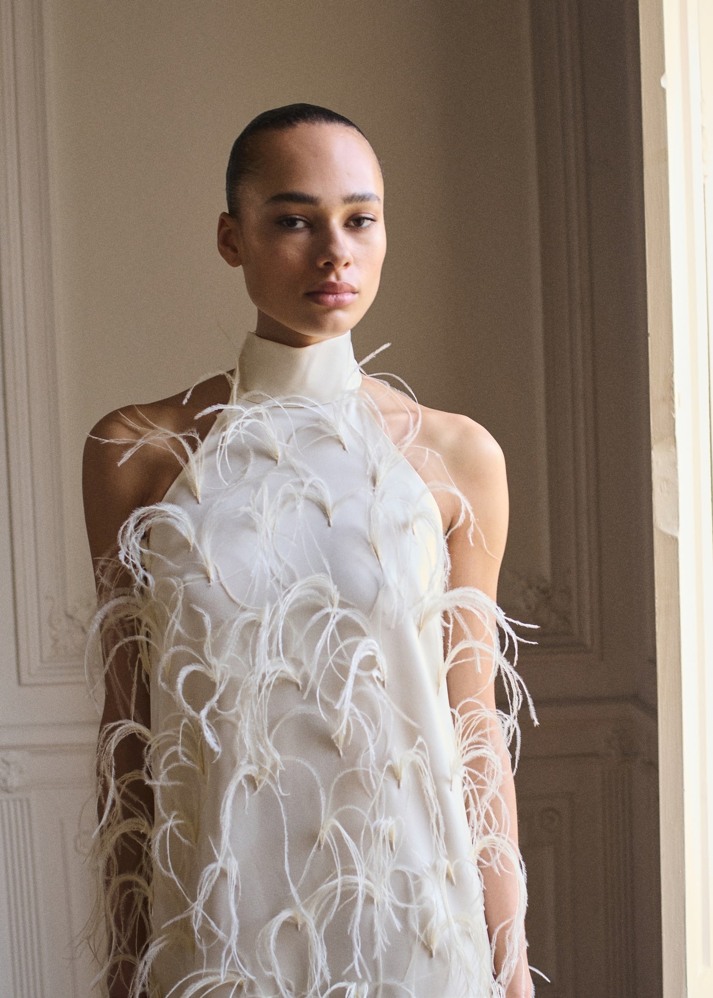 Halter dress with feather decoration