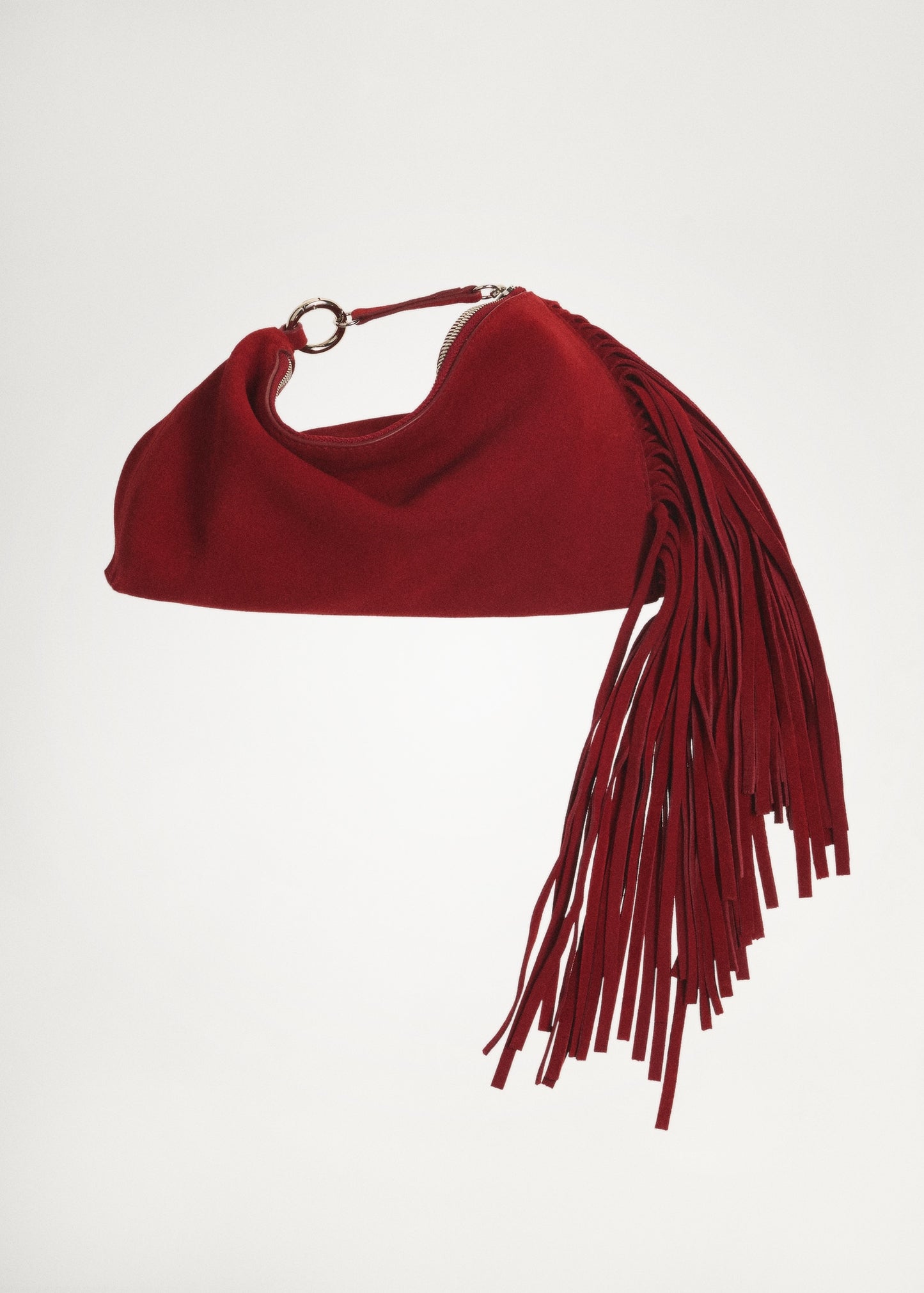 Leather handbag with fringes