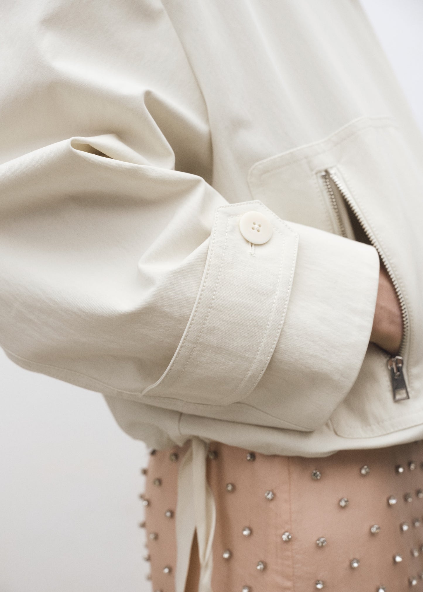 Bomber jacket with adjustable hem