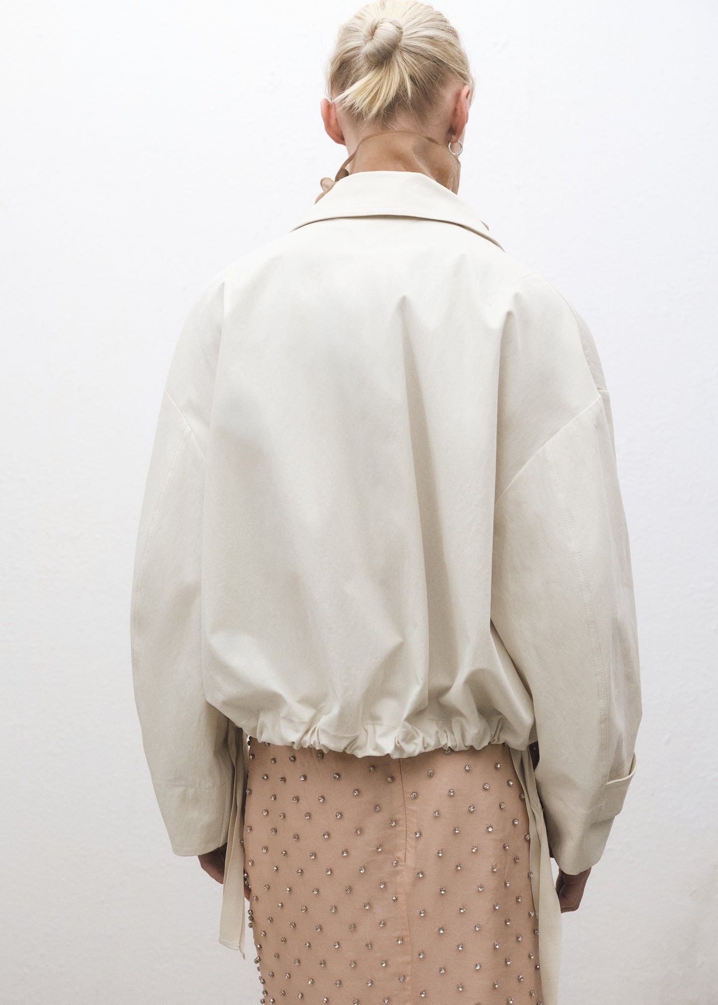 Bomber jacket with adjustable hem