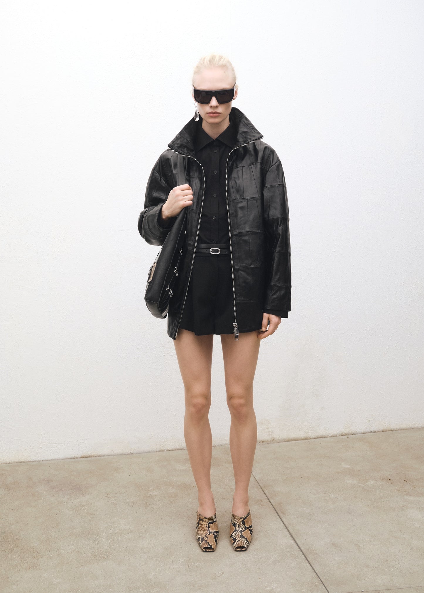 Oversized patchwork leather coat
