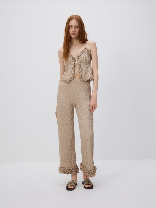 Trousers with ruffle detail