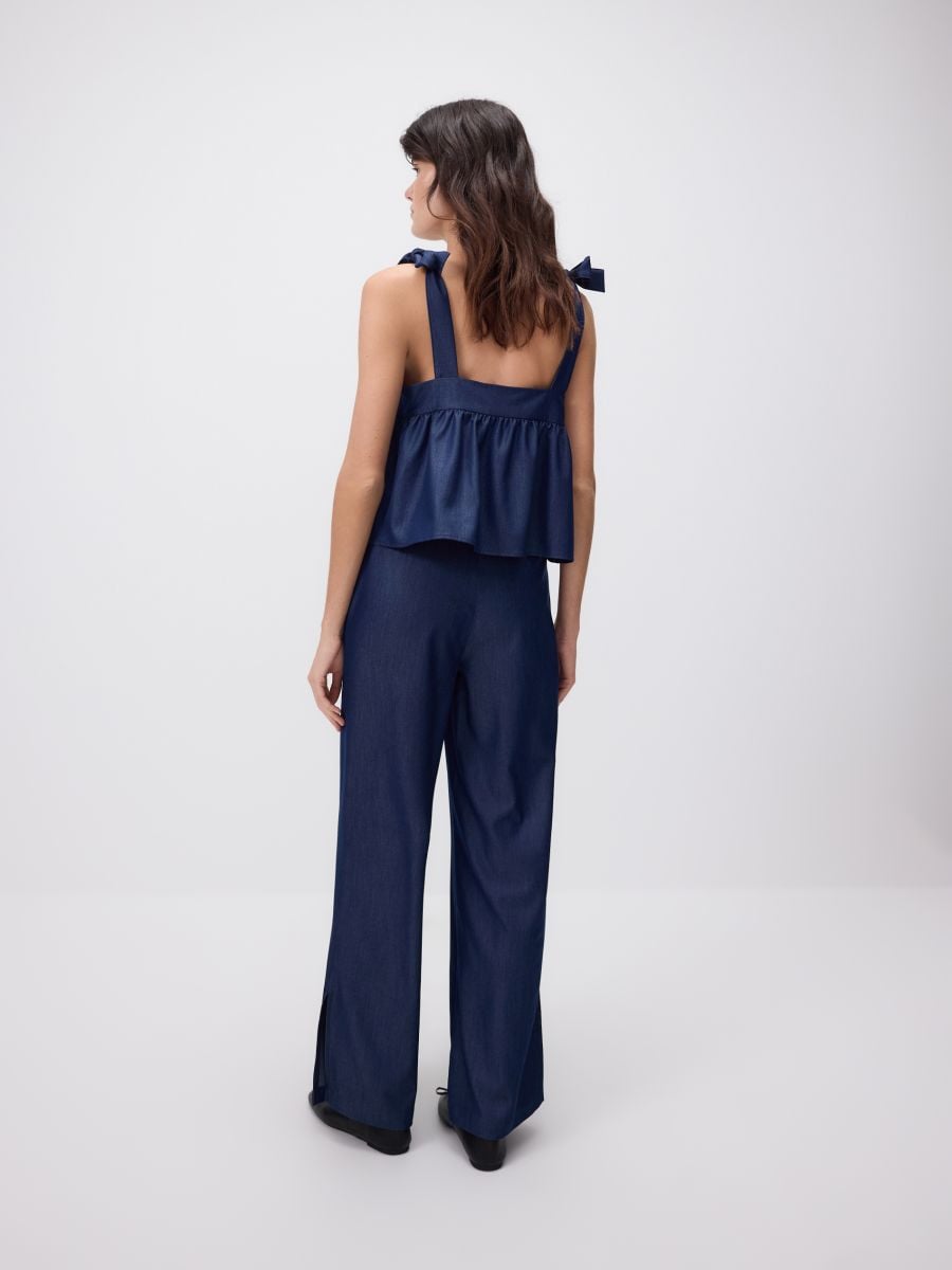 Wide leg jeans with slit