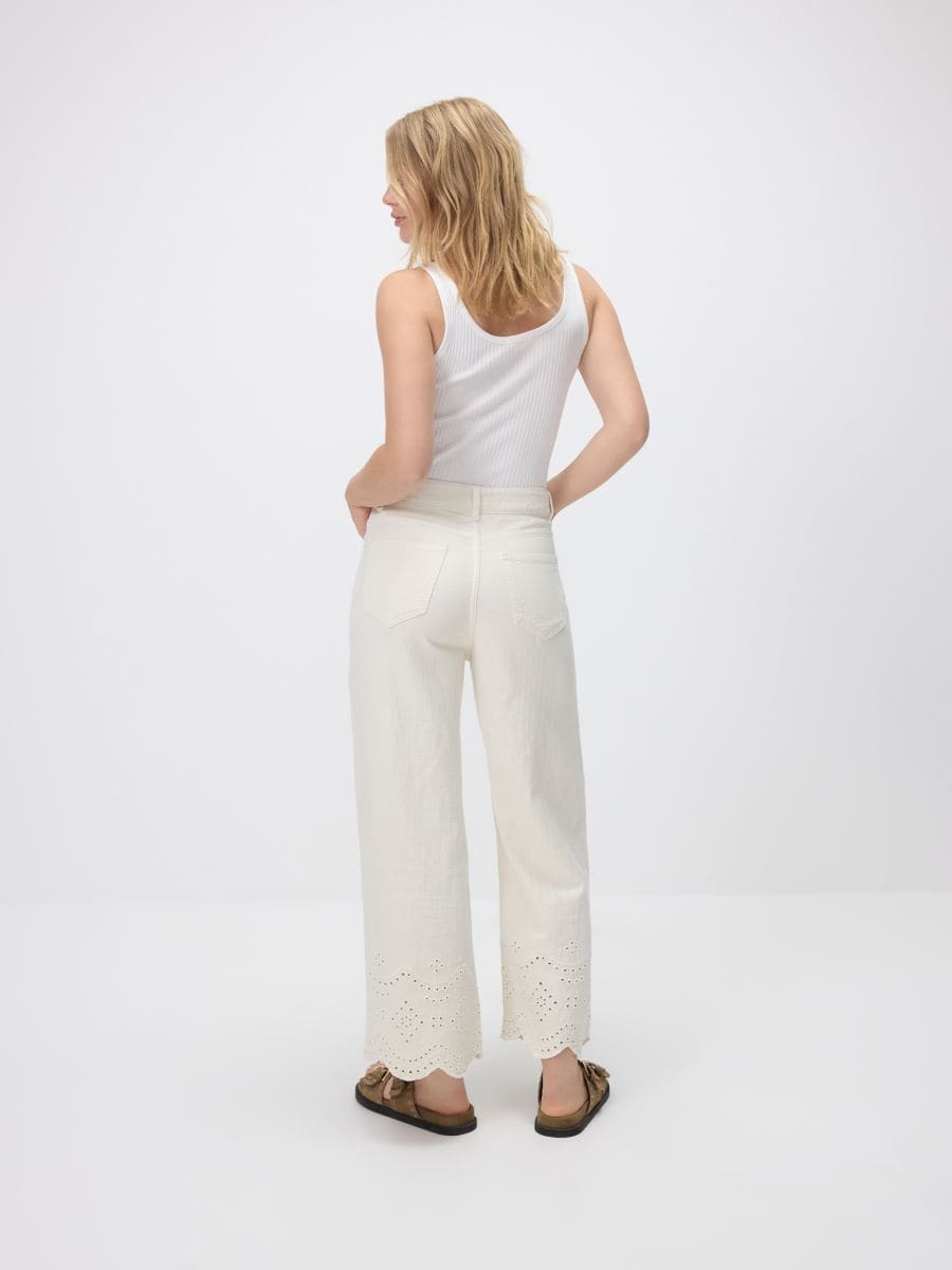 Wide-leg jeans with lace pattern