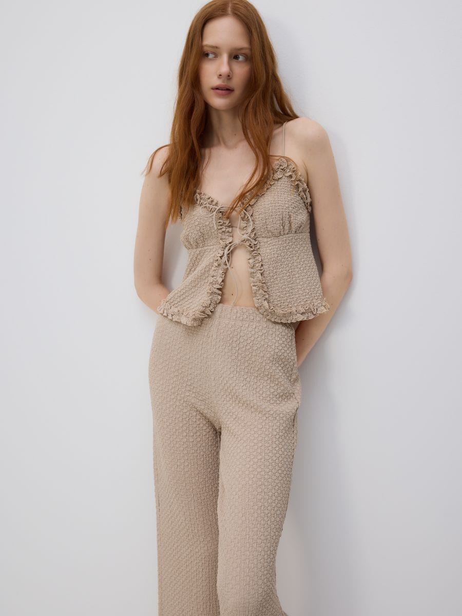 Trousers with ruffle detail