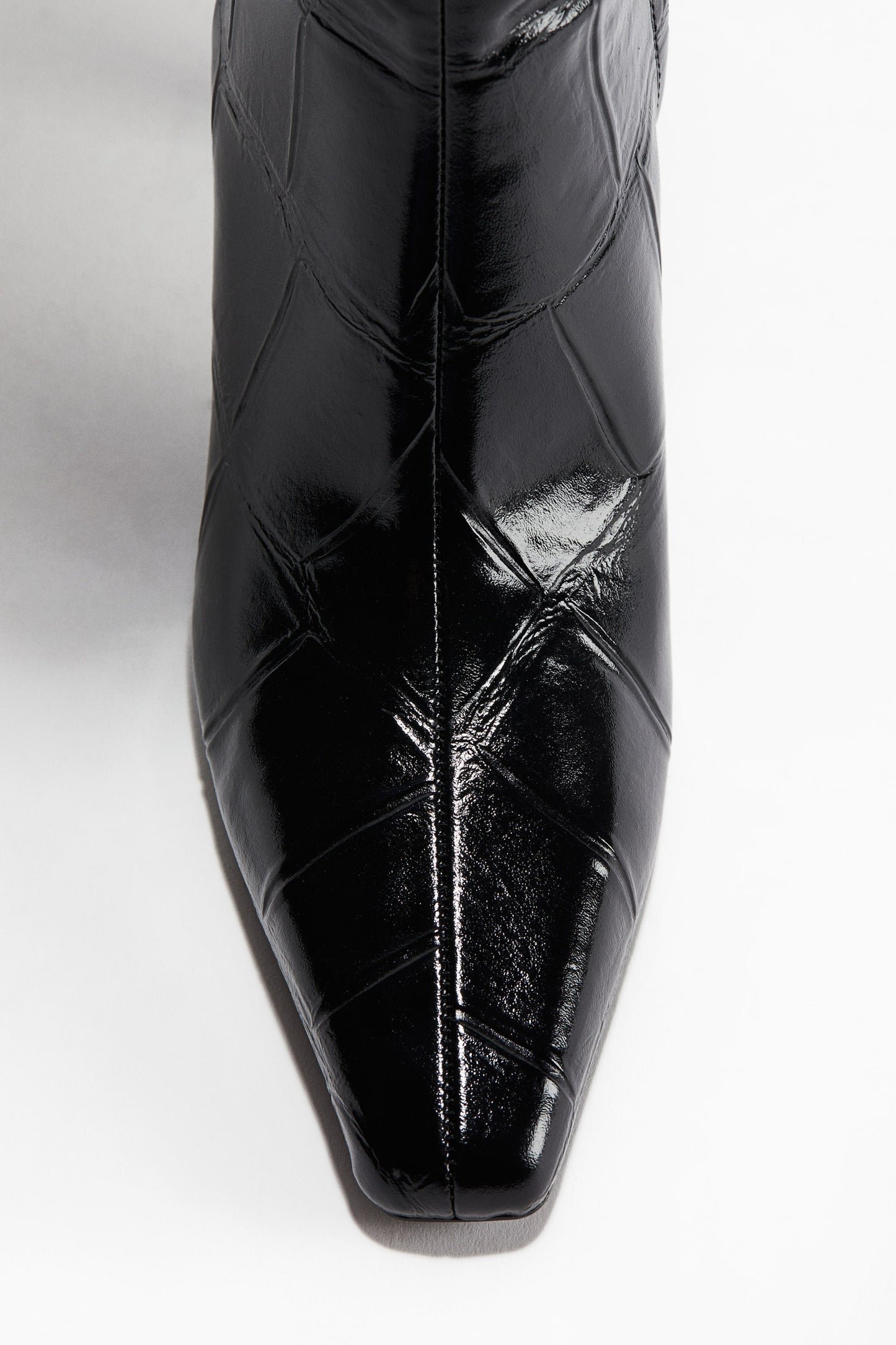 Heeled knee-high boots