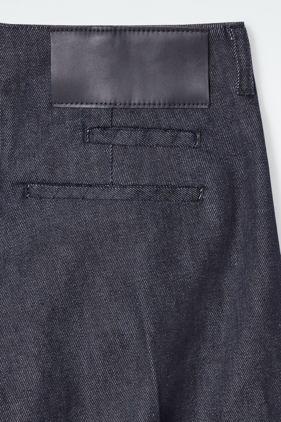 The wide-leg raw denim jeans