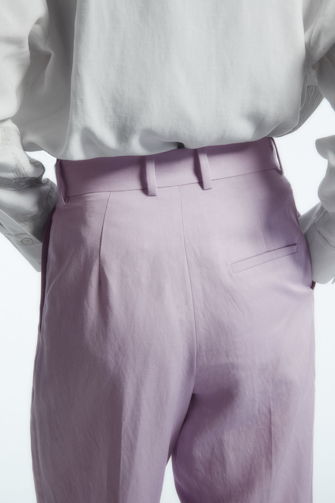 Pleated linen-blend wide-leg trousers