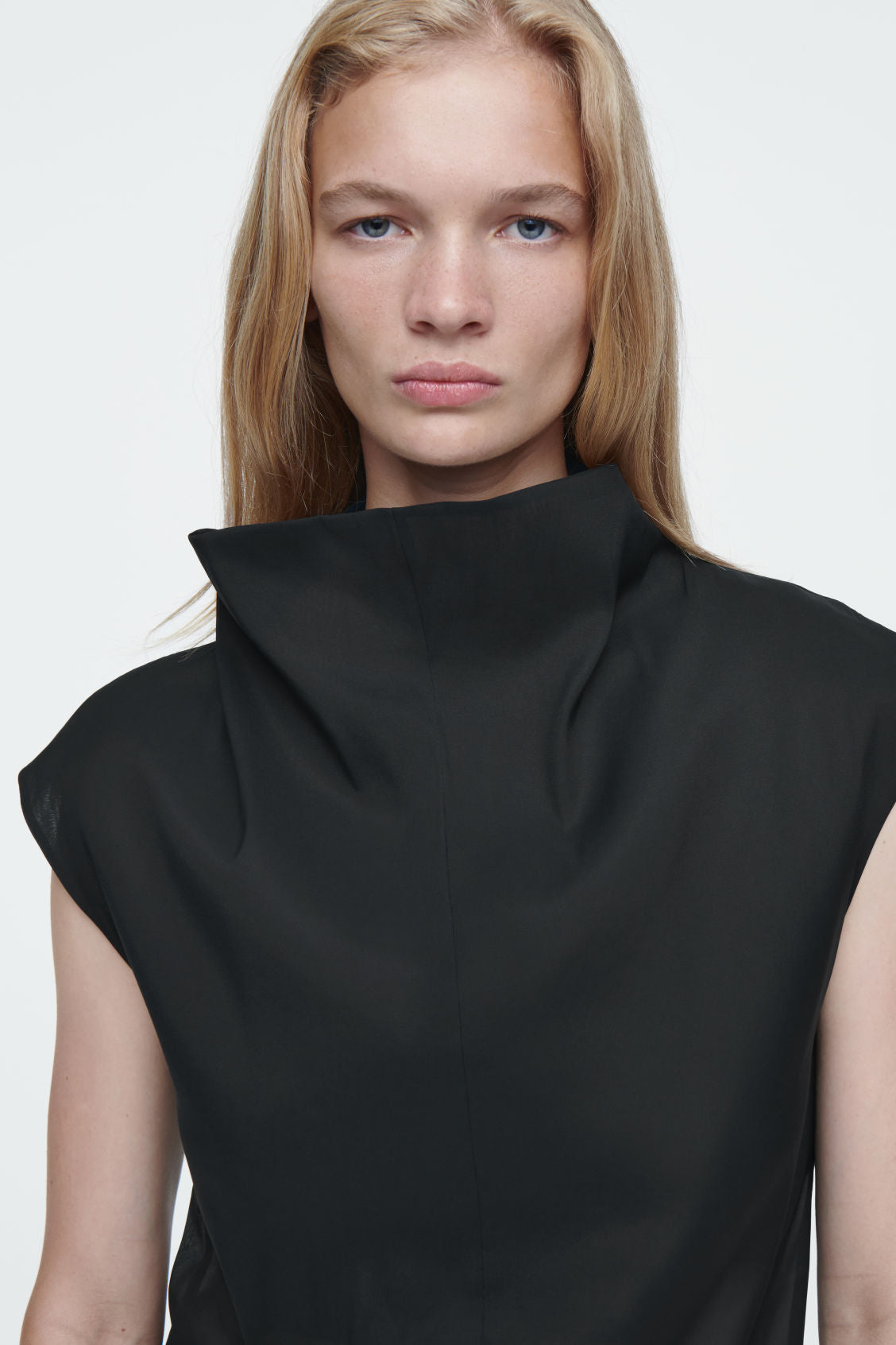 The sheer sleeveless top