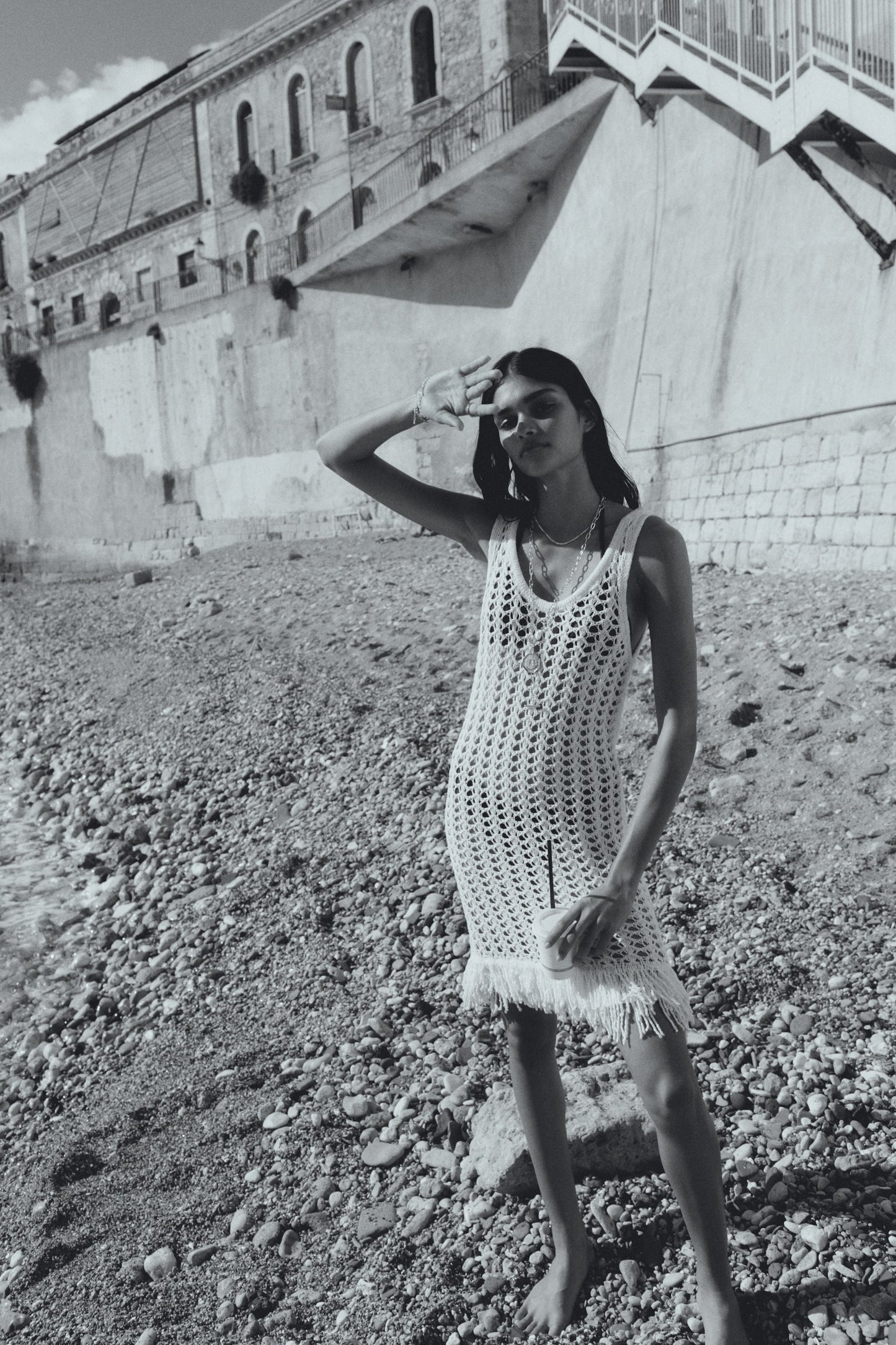 Fringe-trimmed hole-knit dress
