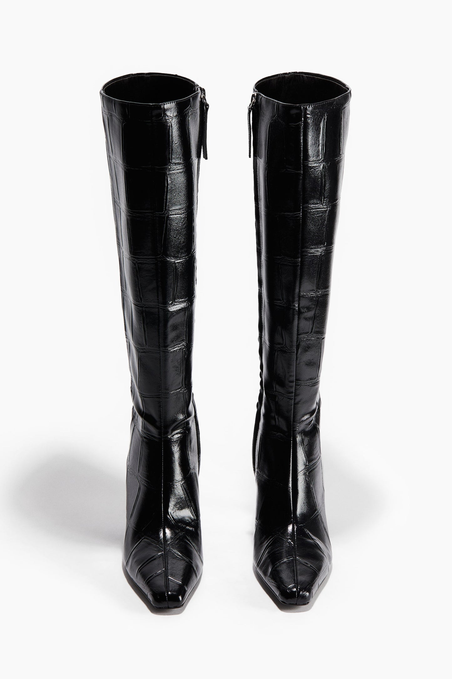 Heeled knee-high boots