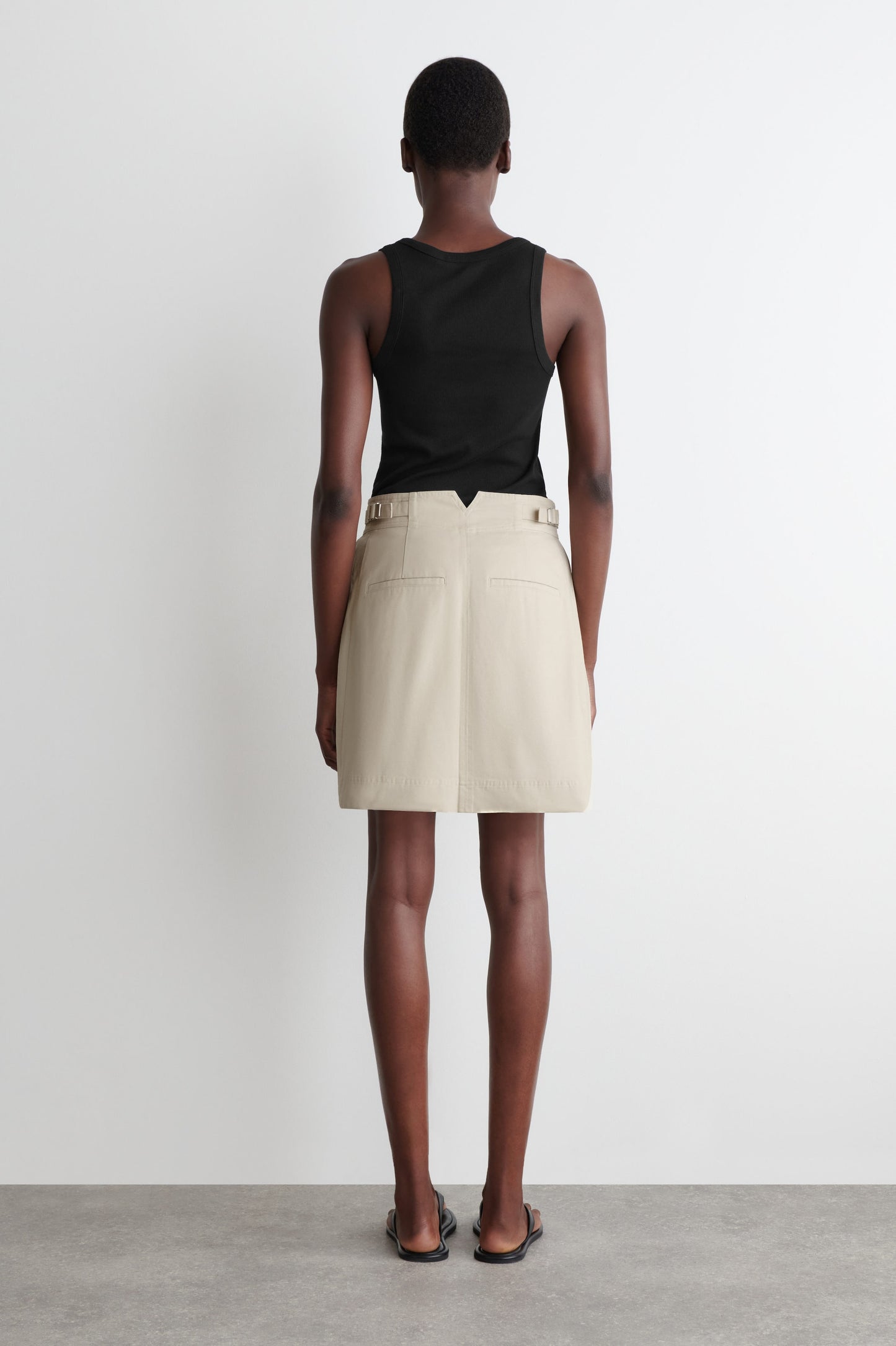 Pleated Buckle-Detail Mini Skirt