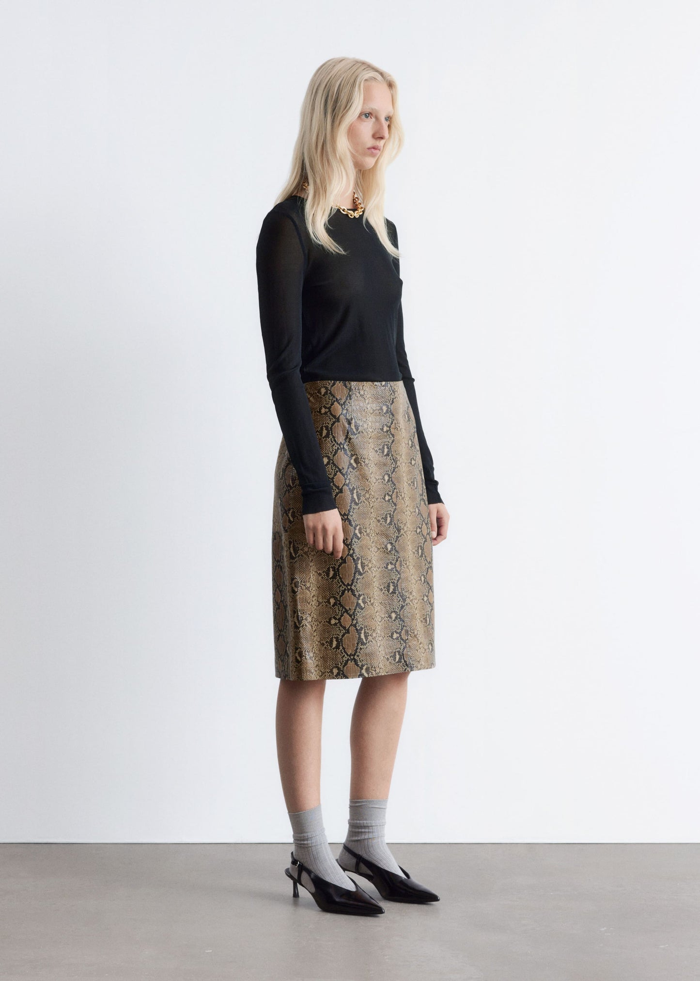 Snake Pattern Leather Midi Skirt